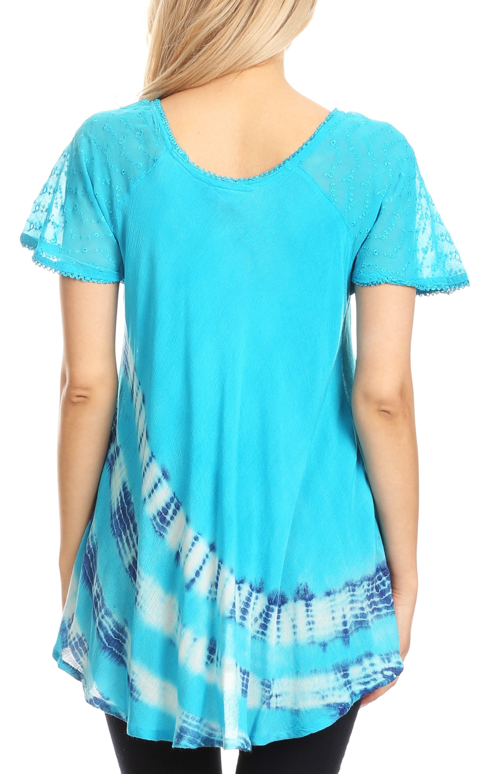 Blue tunic with tie-dye pattern on a white background