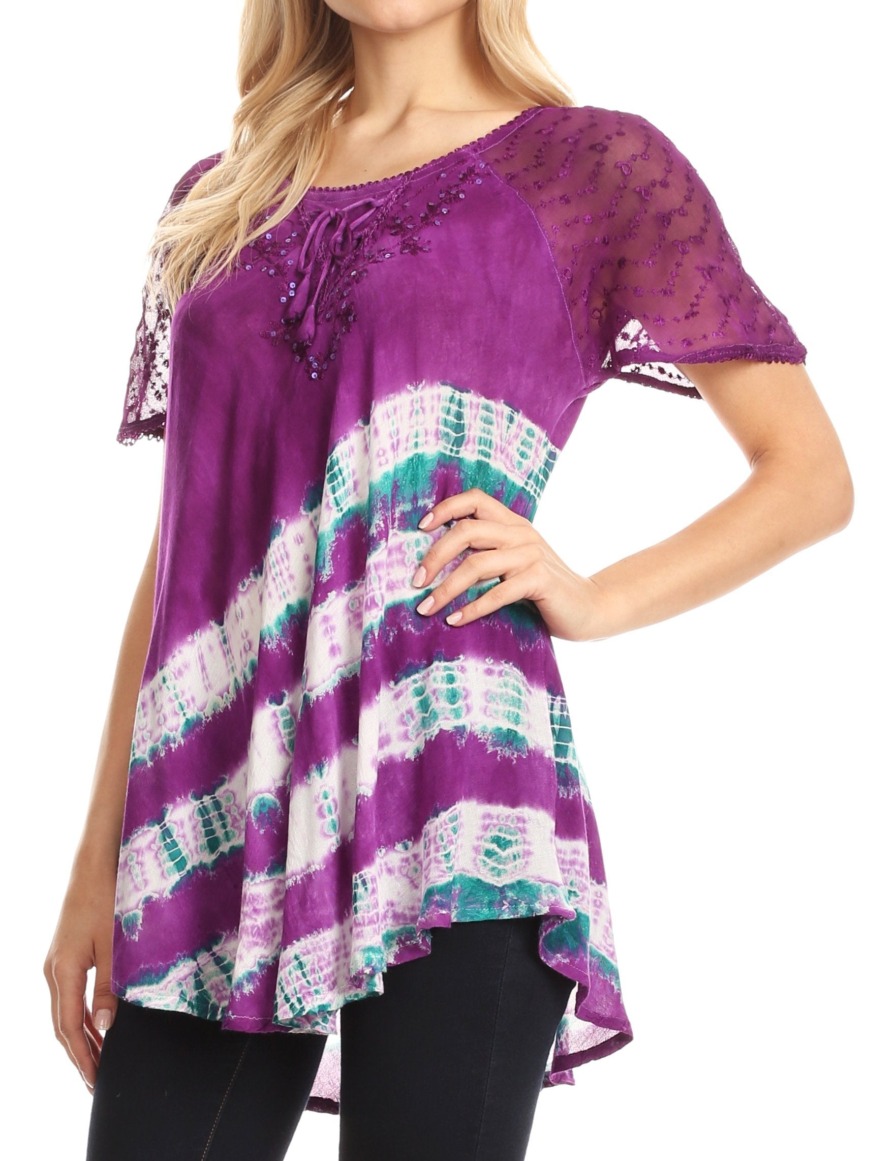 Purple lace top with a colorful pattern worn by a model on a white background