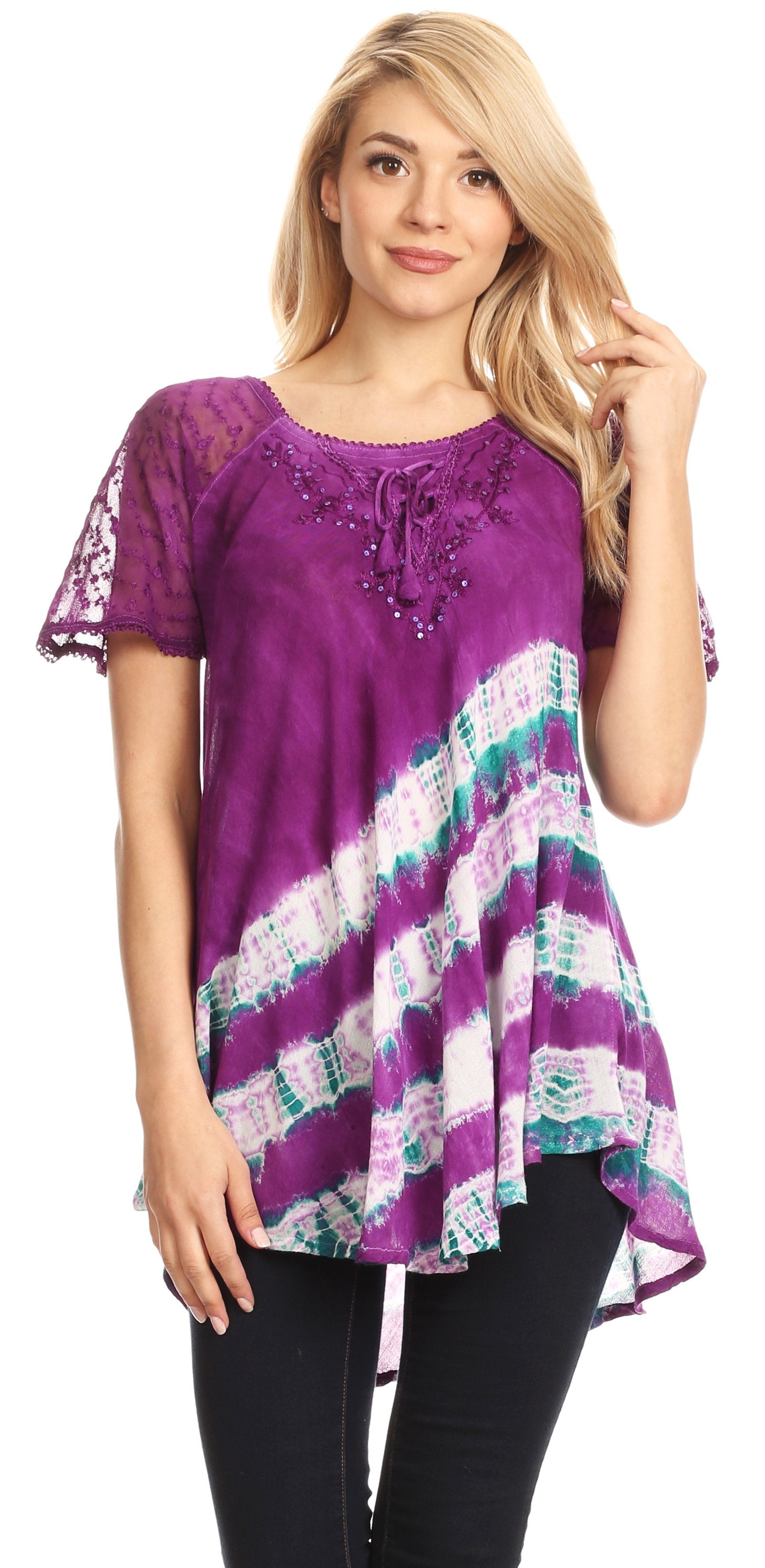 Woman wearing a purple lace top with a colorful pattern on a white background