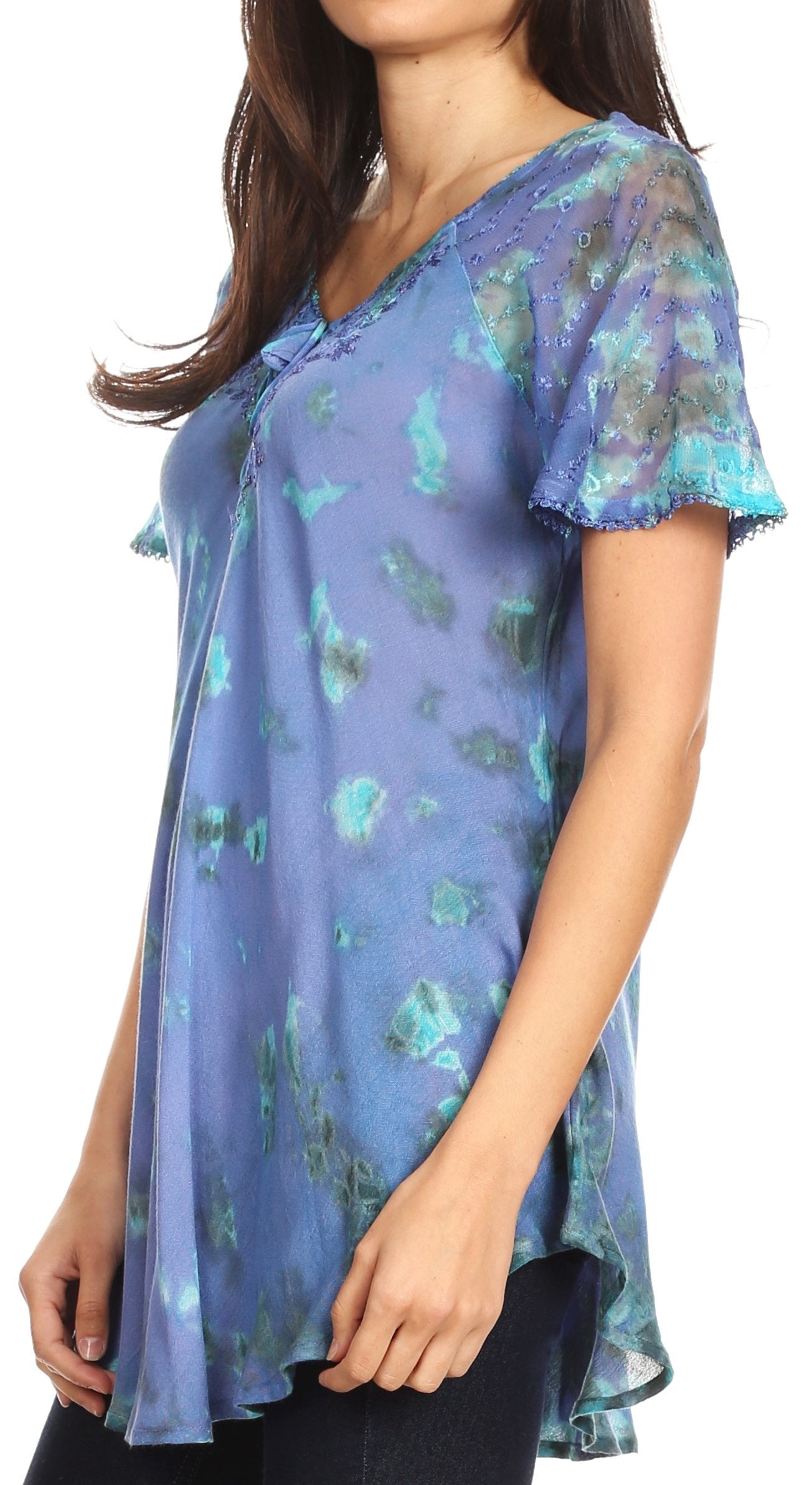 Woman wearing a blue floral blouse on a white background