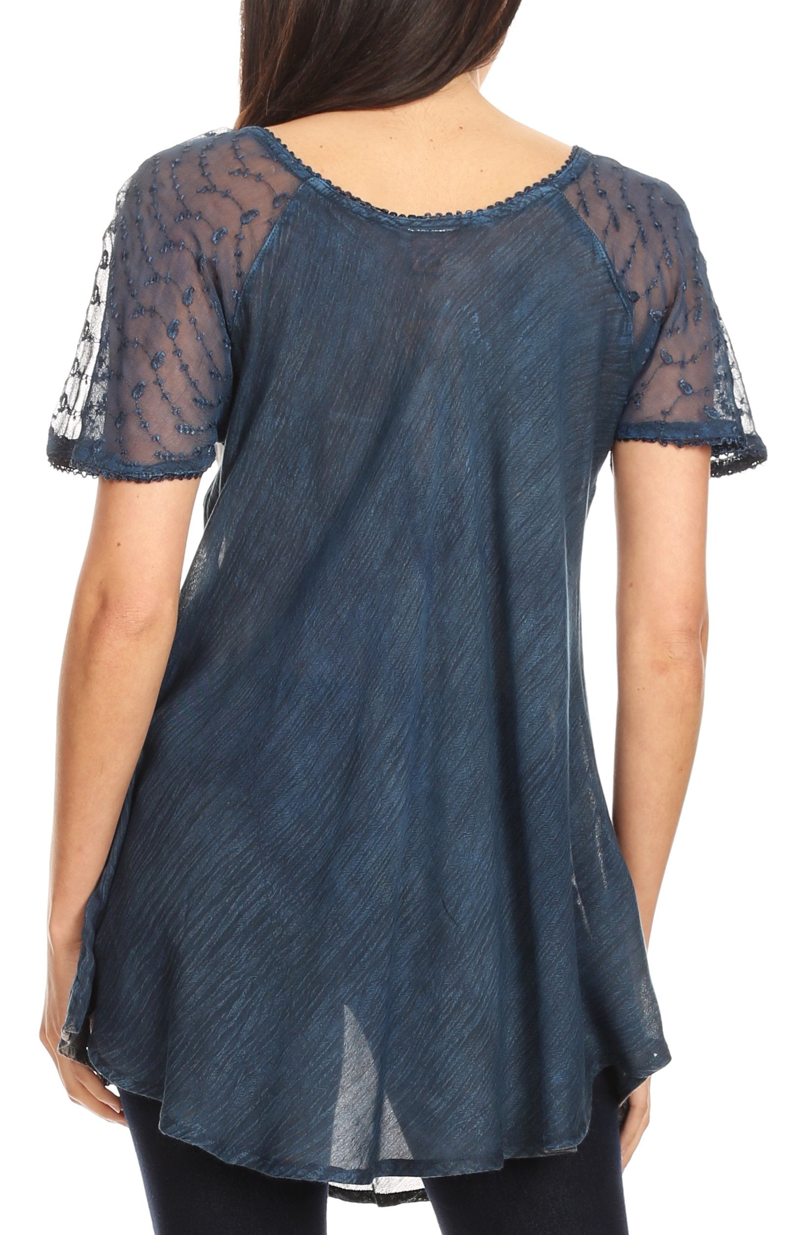 Blue lace top worn by a person on a white background