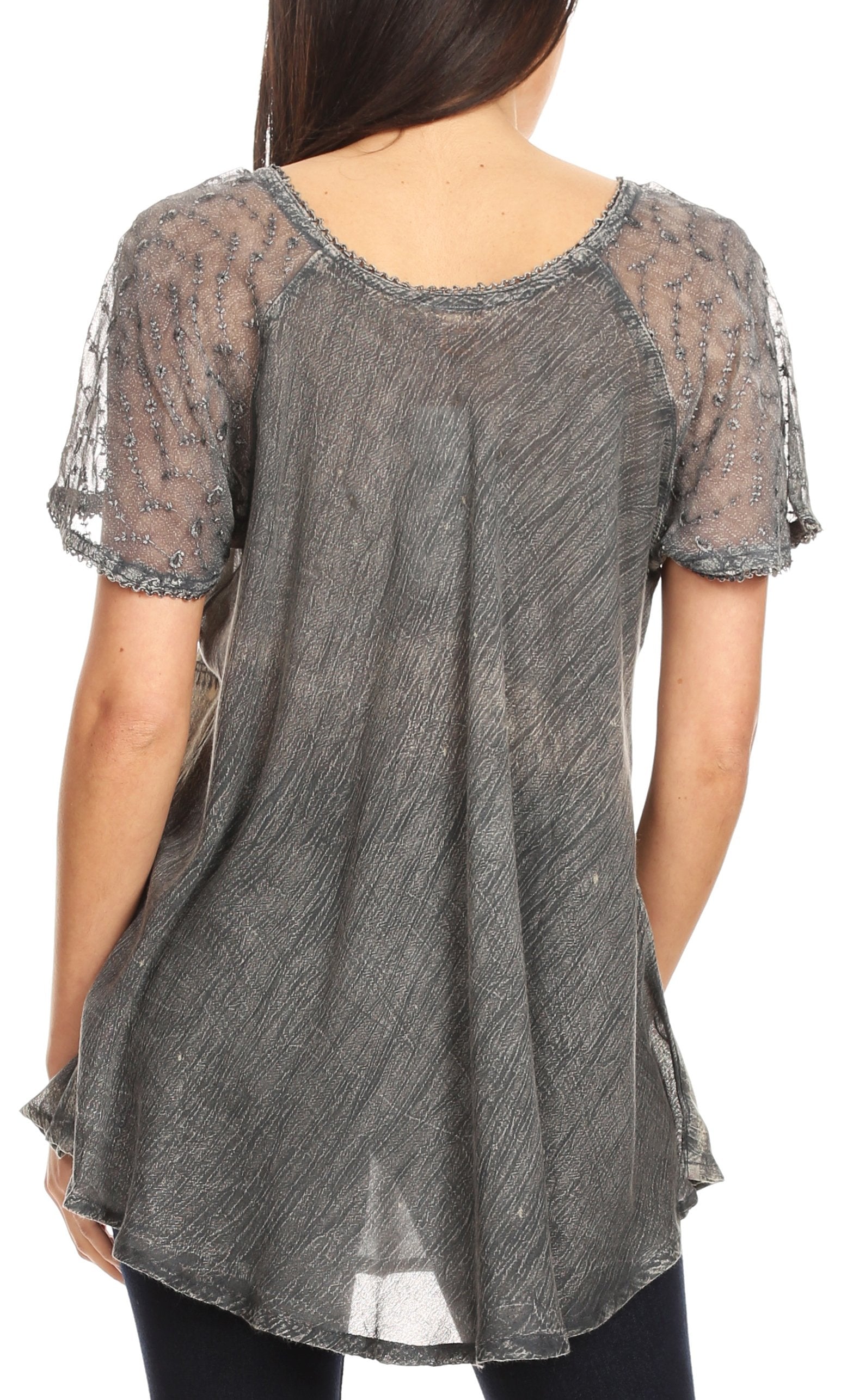 Sheer gray top with lace details on a white background