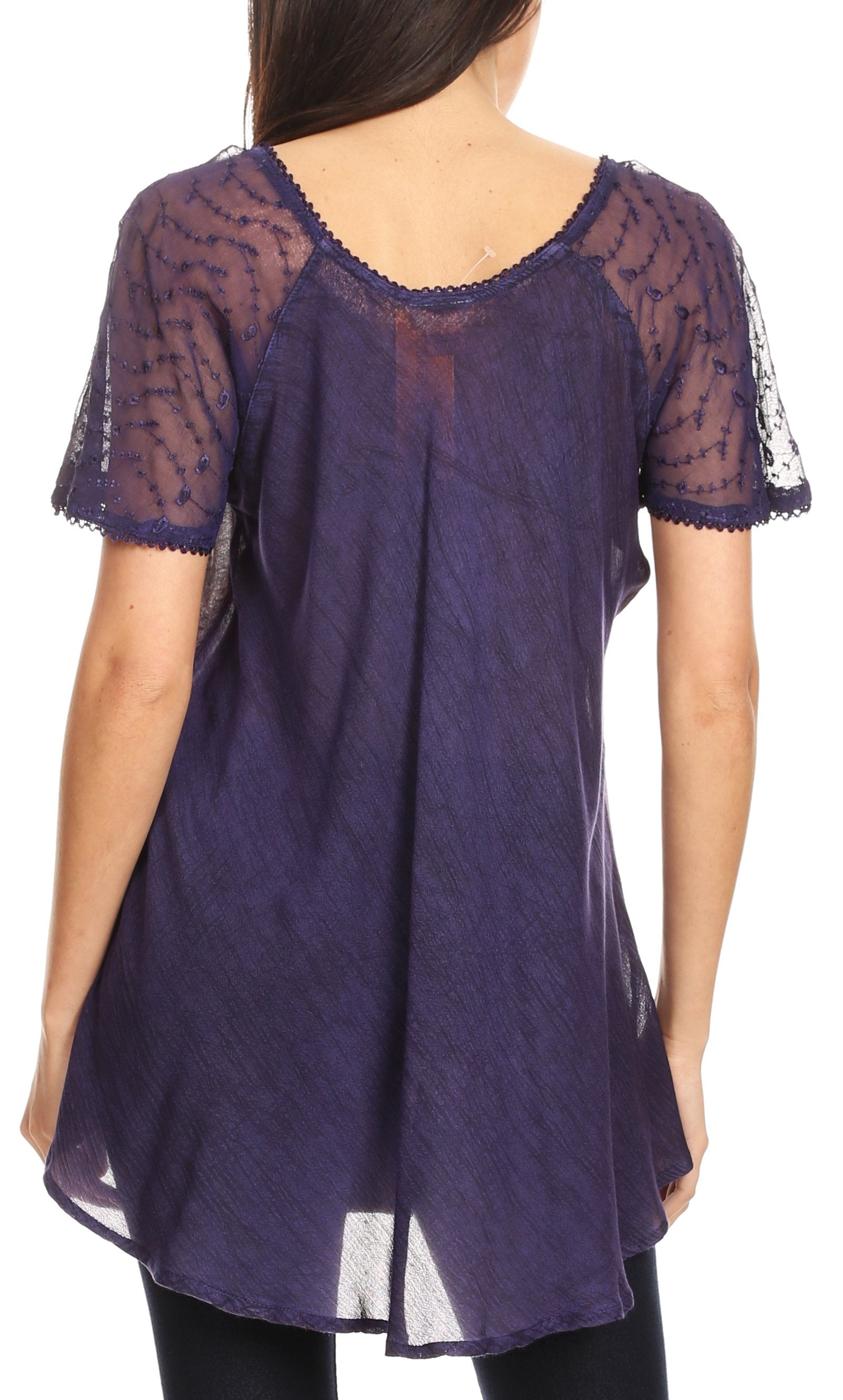 Purple lace-trimmed top worn by a person on a white background