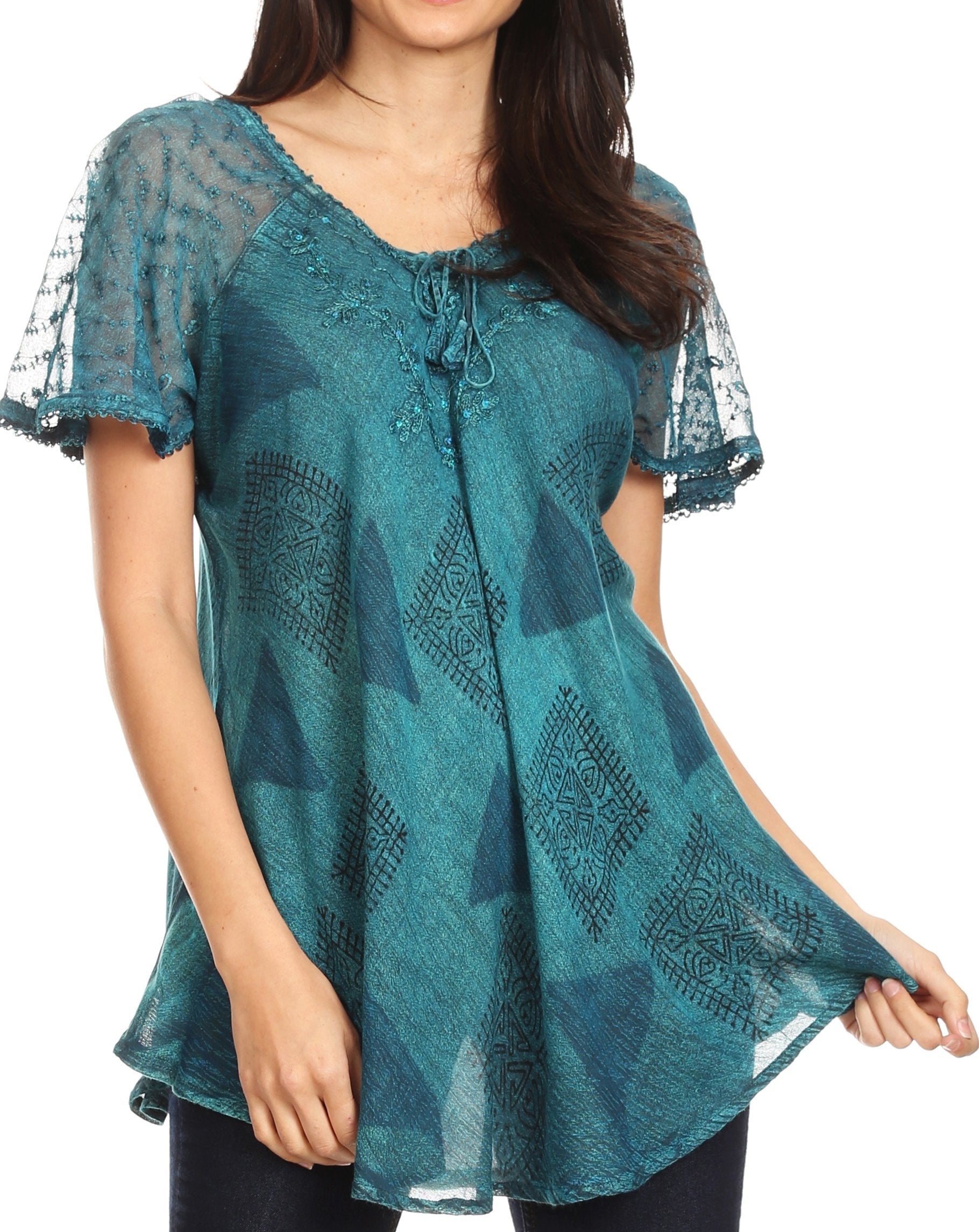 Teal lace top worn by a model on a white background