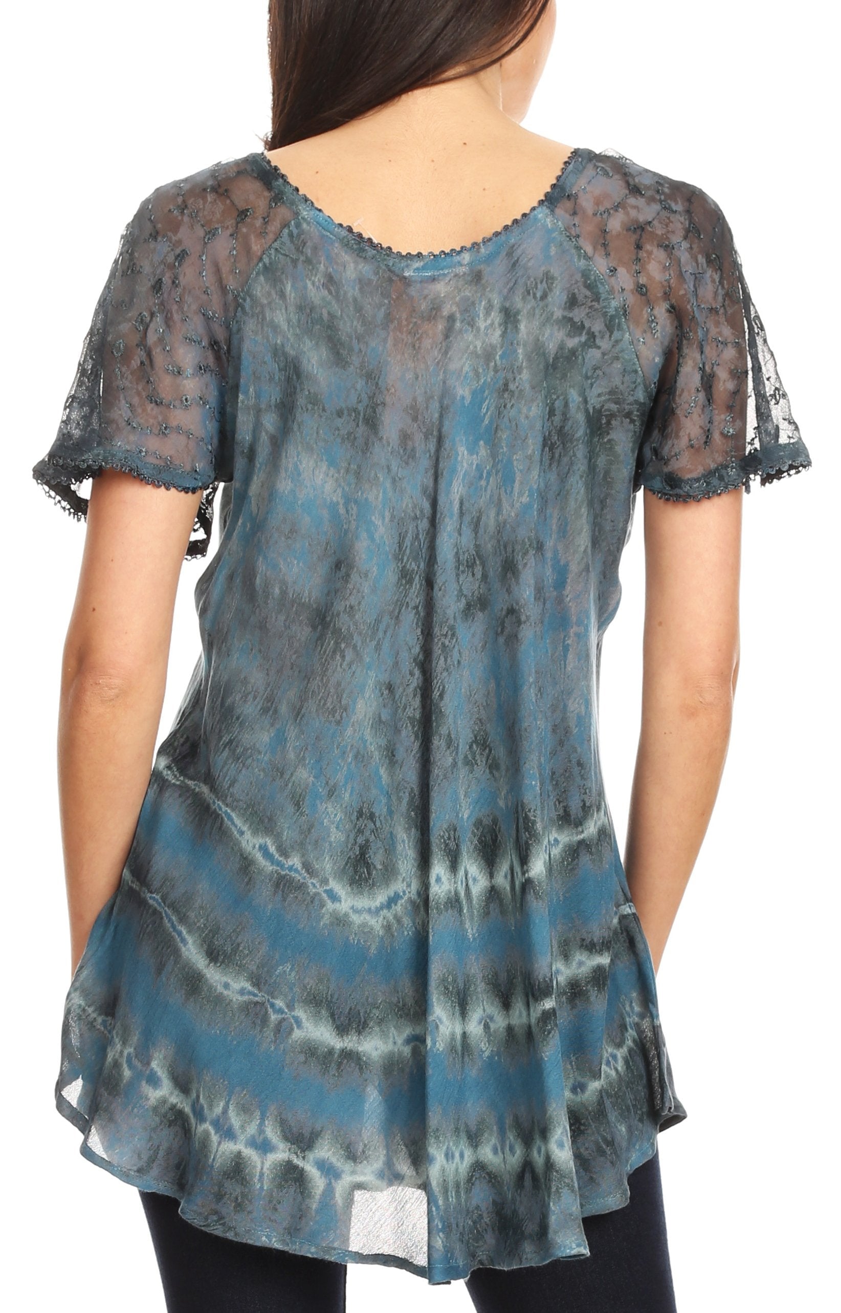 Blue and black tie-dye top with sheer sleeves worn by a person on a white background