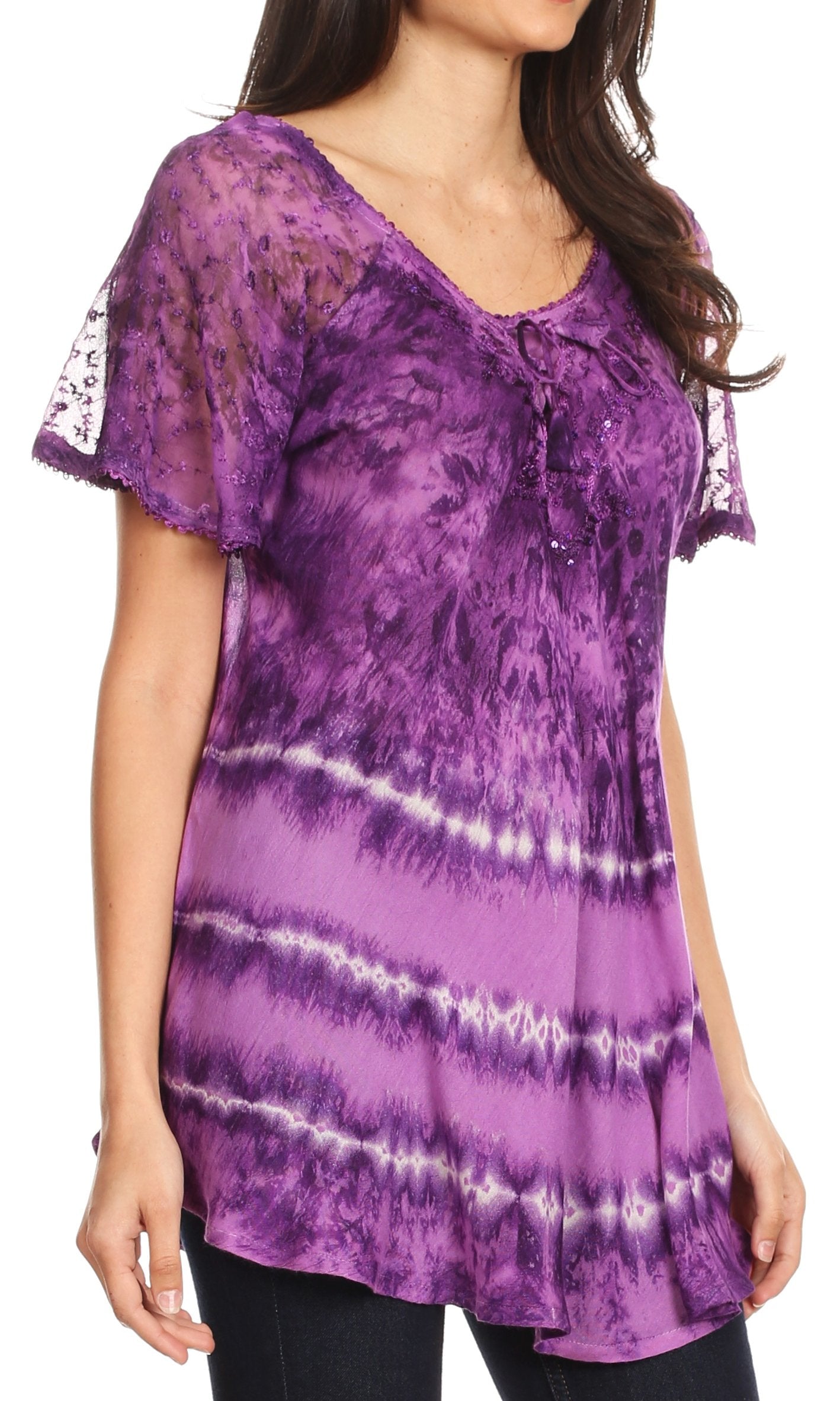 Purple tie-dye shirt worn by a person on a white background