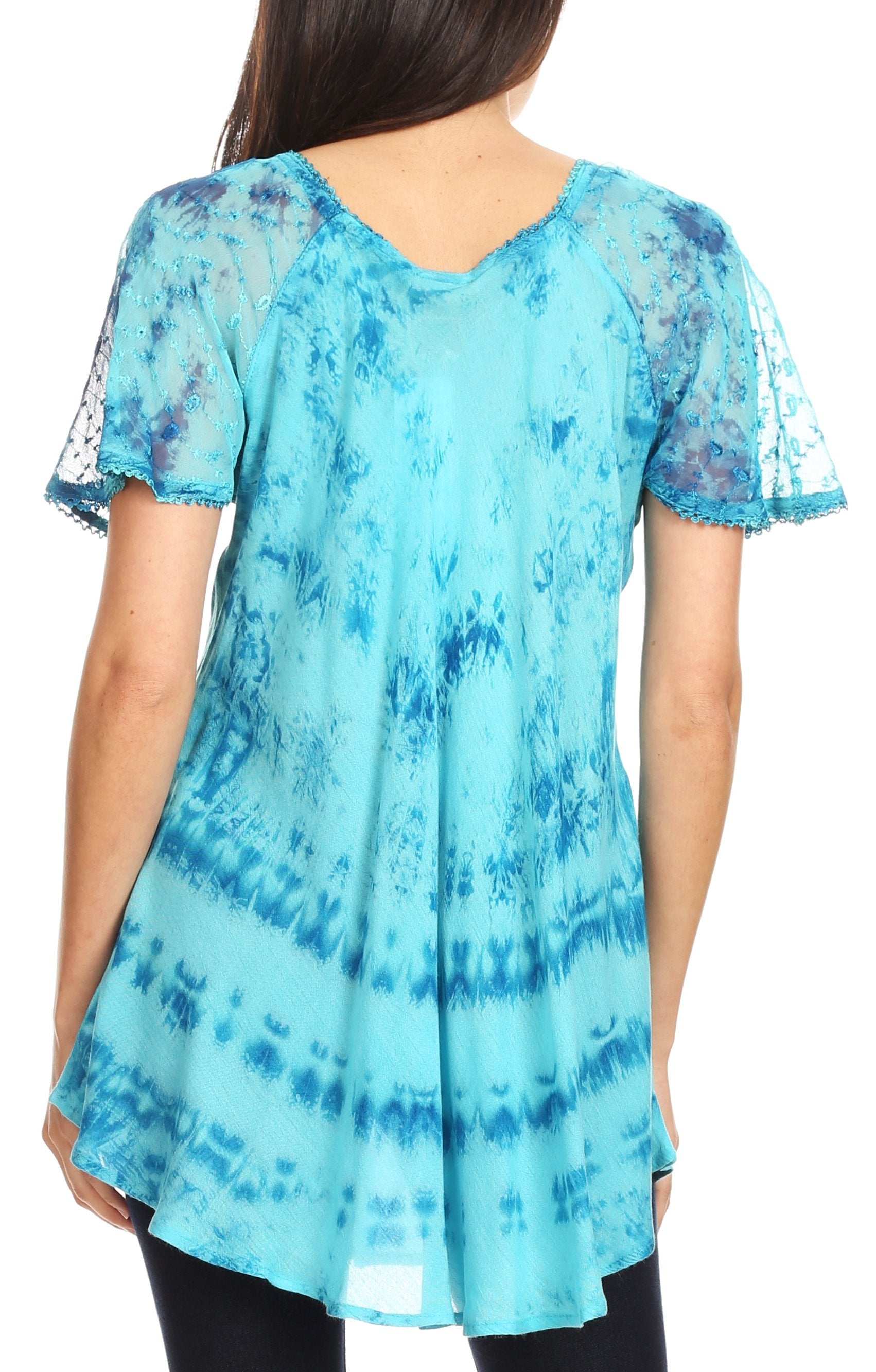 Blue tie-dye top with lace sleeves worn by a person on a white background