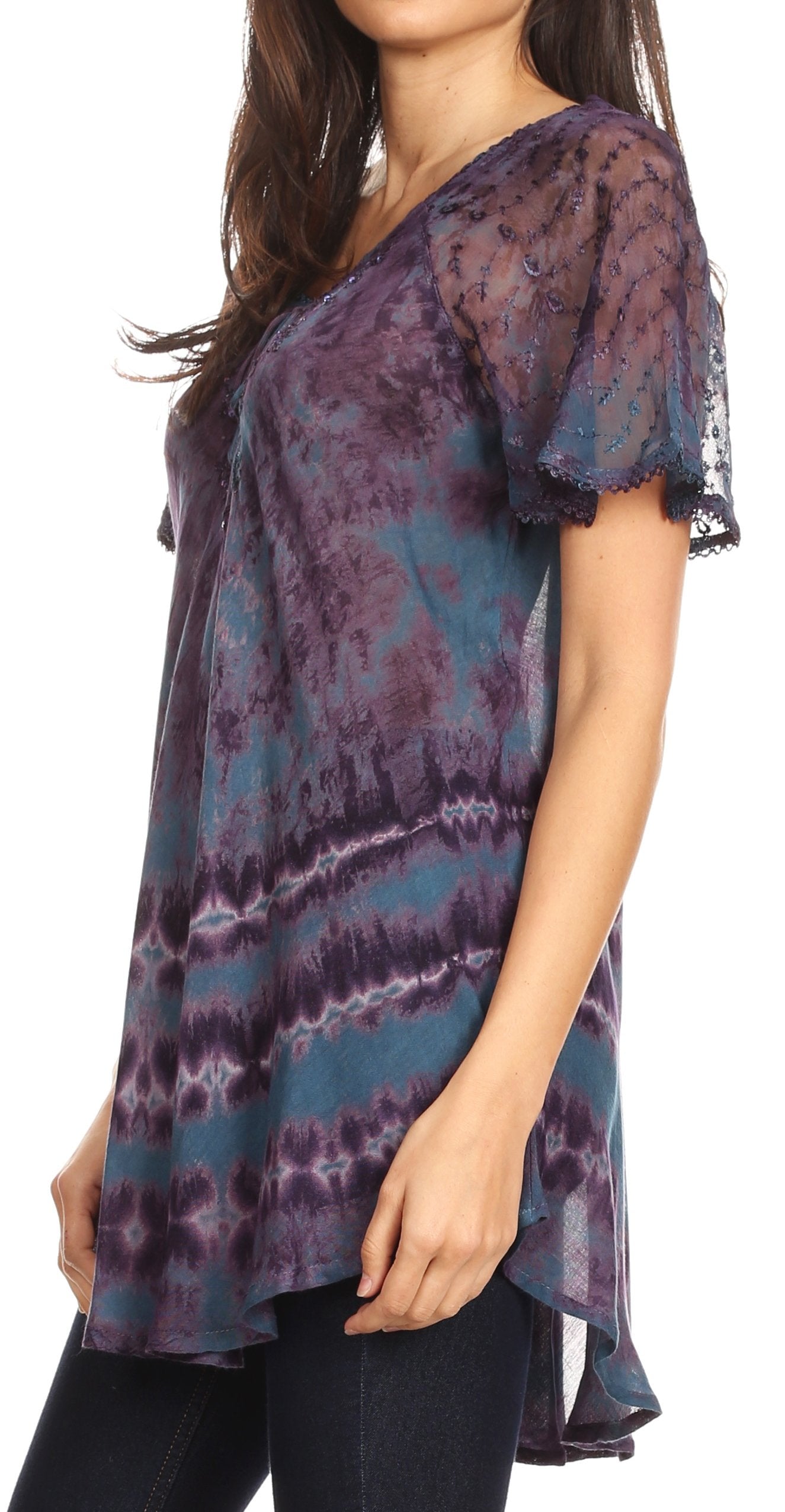 Woman wearing a tie-dye shirt with a white background