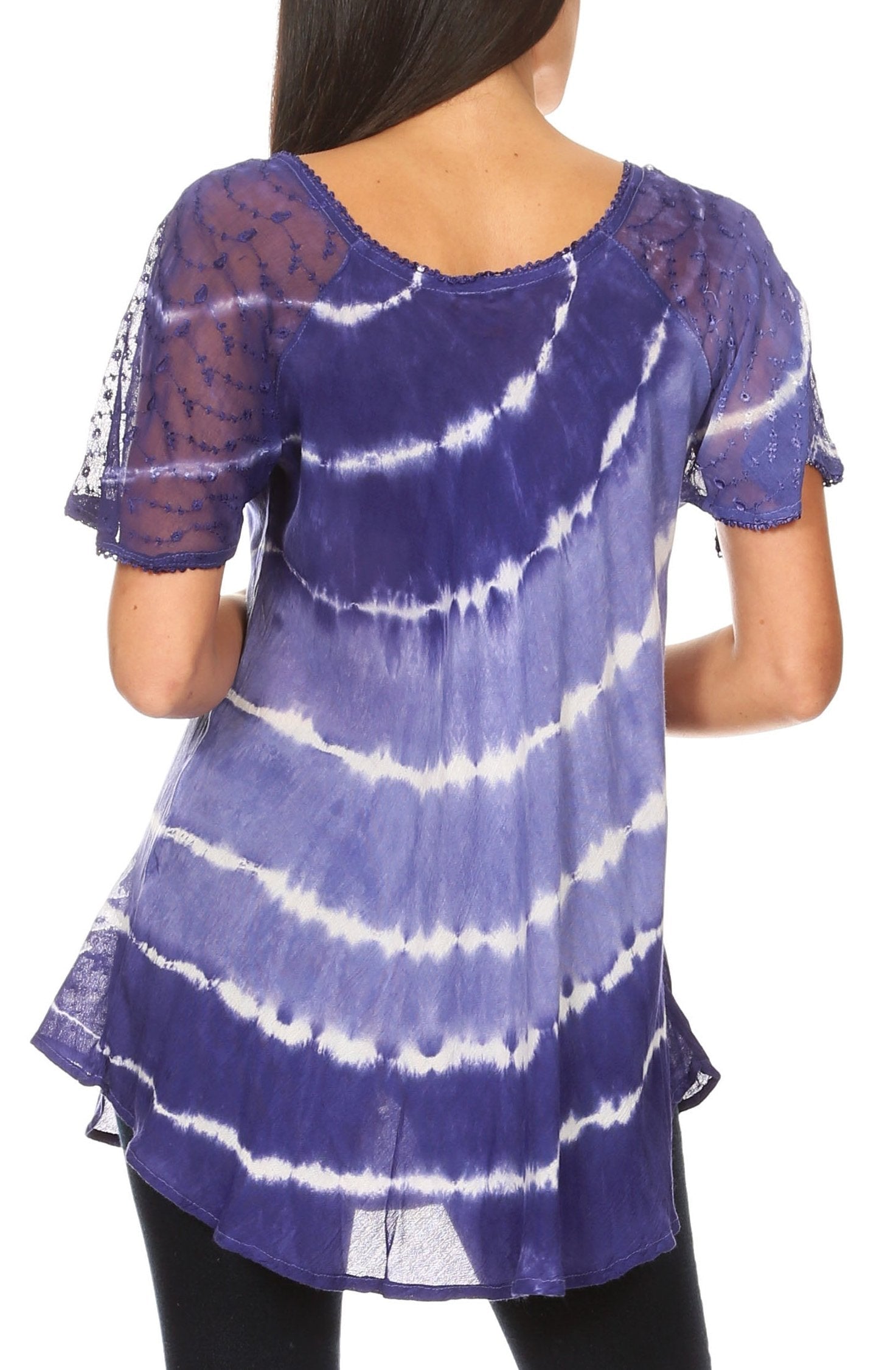 Purple and white tie-dye top worn by a person on a white background
