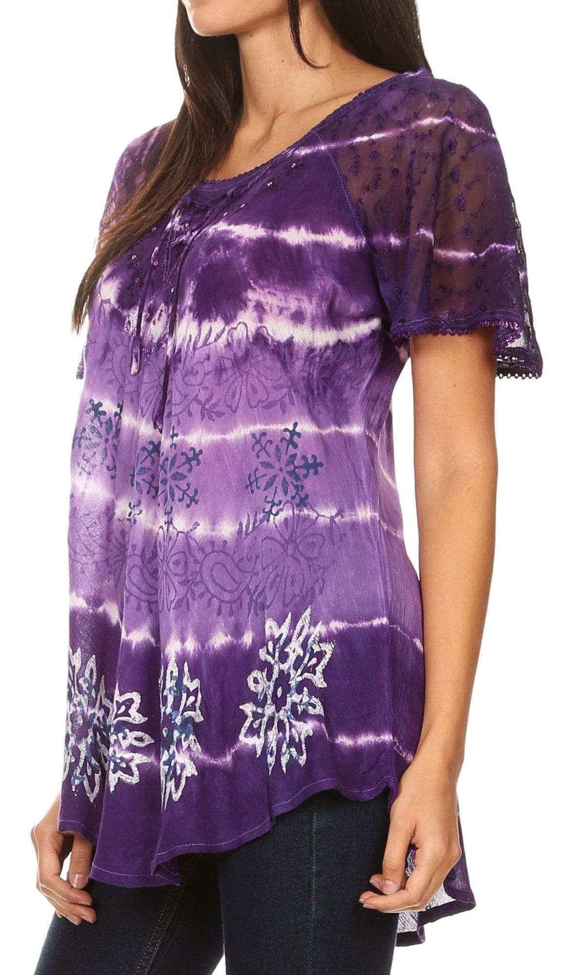 Purple tie-dye shirt with white patterns worn by a person on a white background