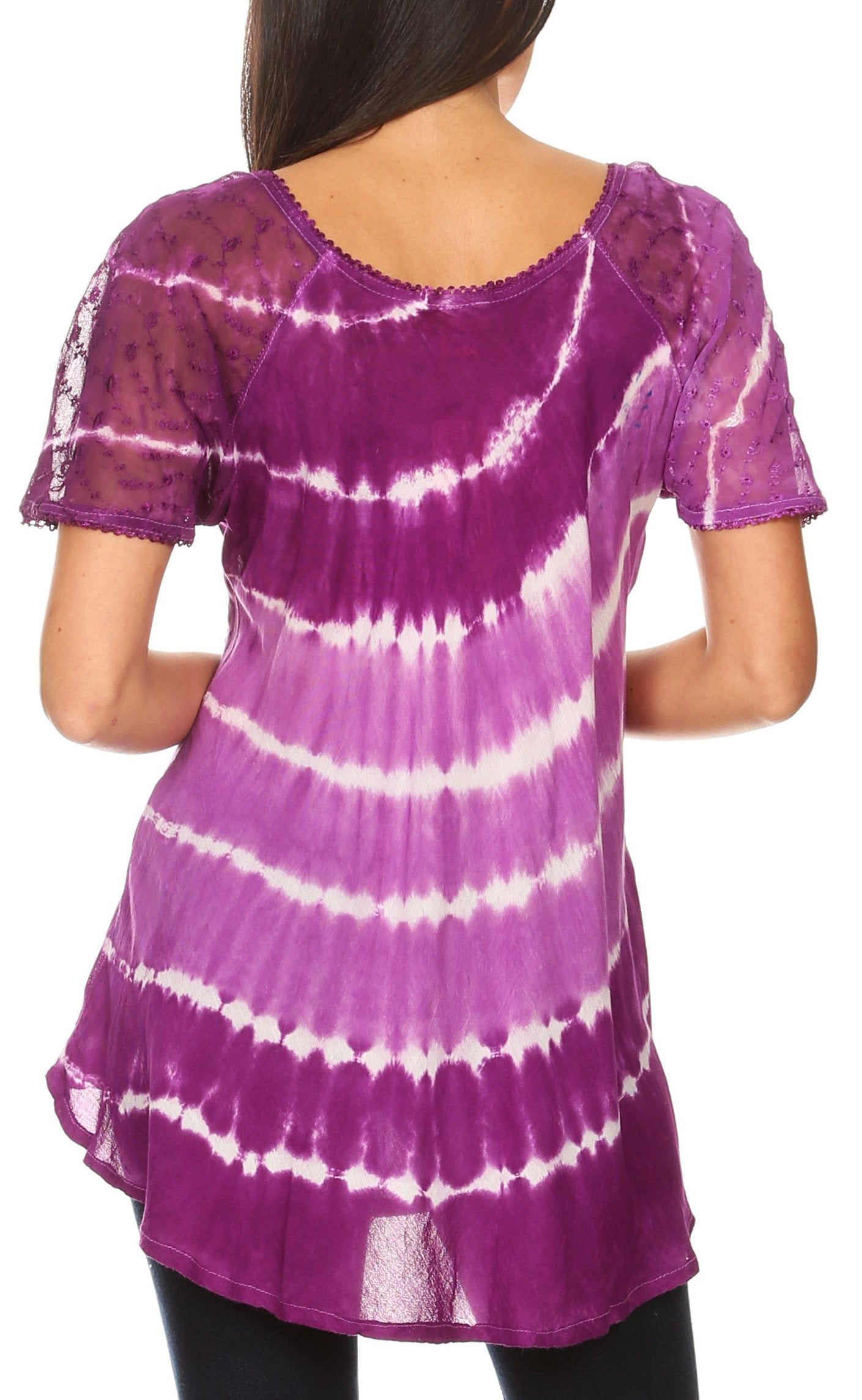 Purple and white tie-dye shirt worn by a person on a white background