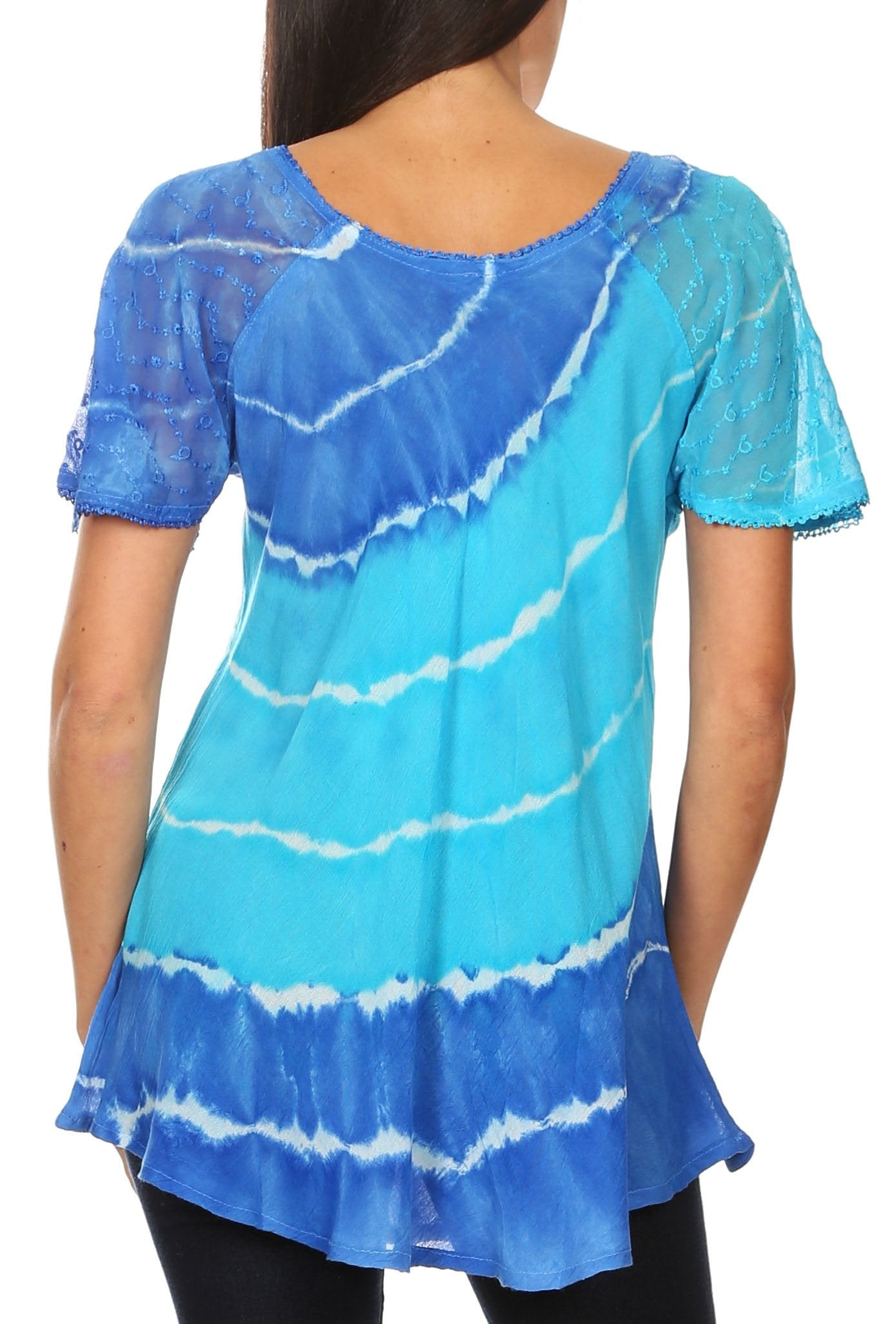 Blue tie-dye top worn by a person on a white background