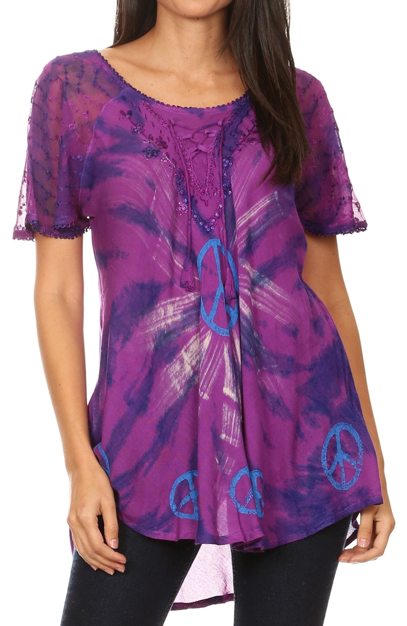 Purple lace top with blue peace signs worn by a model on a white background