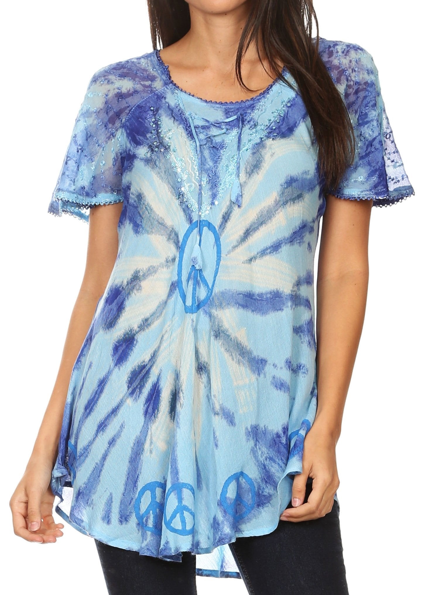 Woman wearing a blue tie-dye t-shirt with peace symbol design on a white background