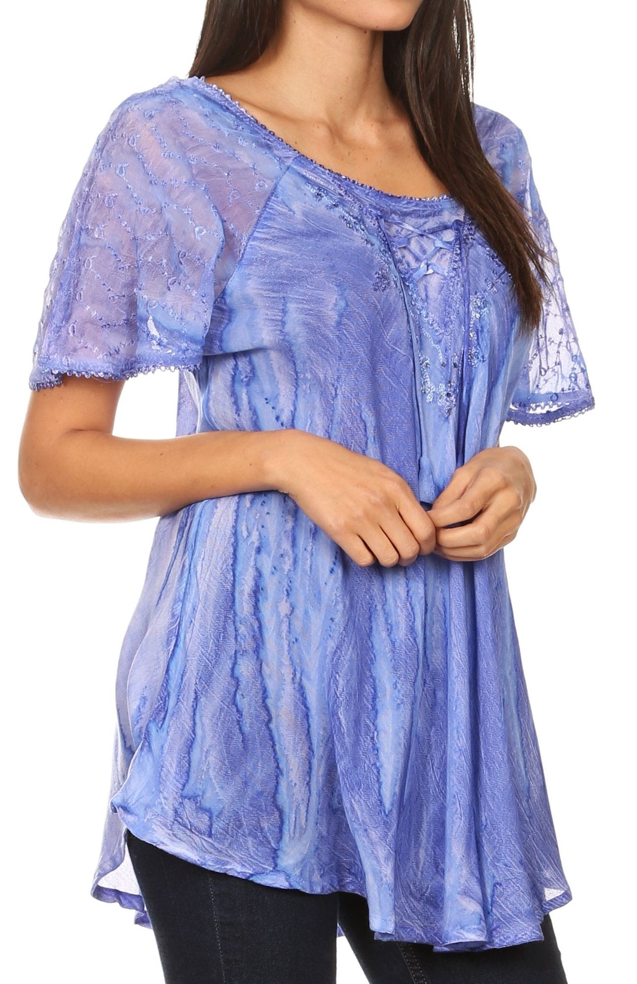 Blue lace top worn by a model on a white background