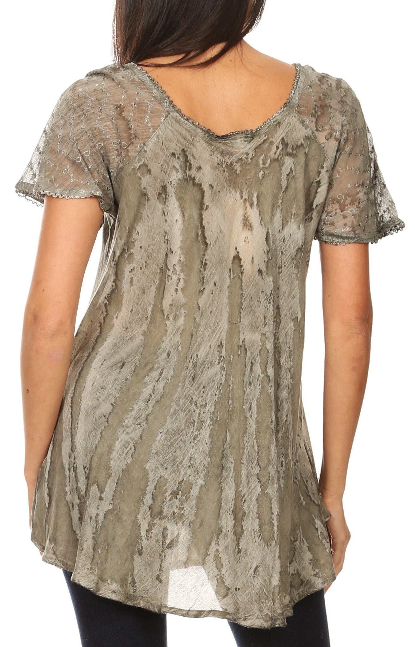 Woman wearing a sheer lace overlay top on a white background