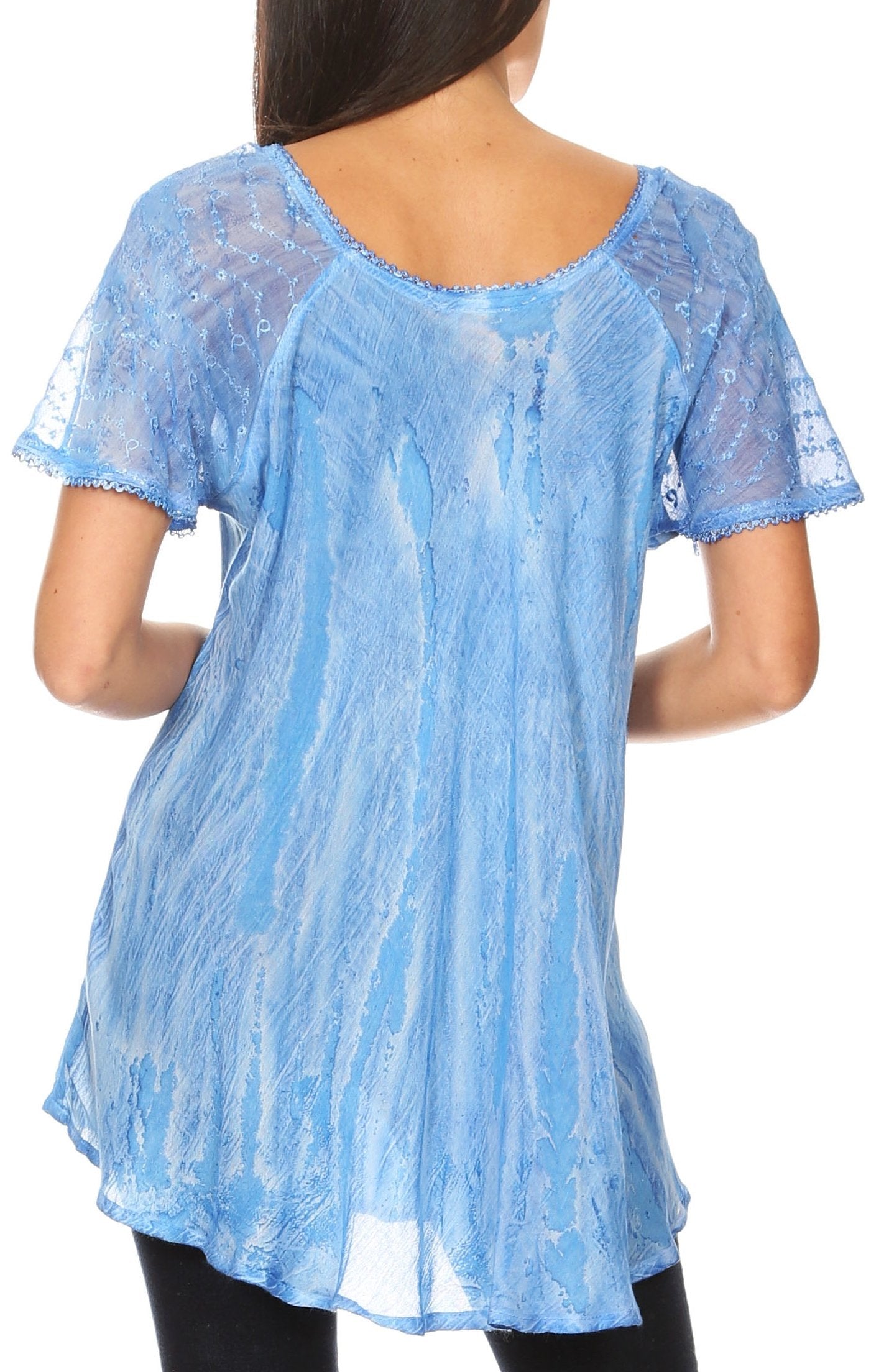 Blue lace top worn by a person on a white background