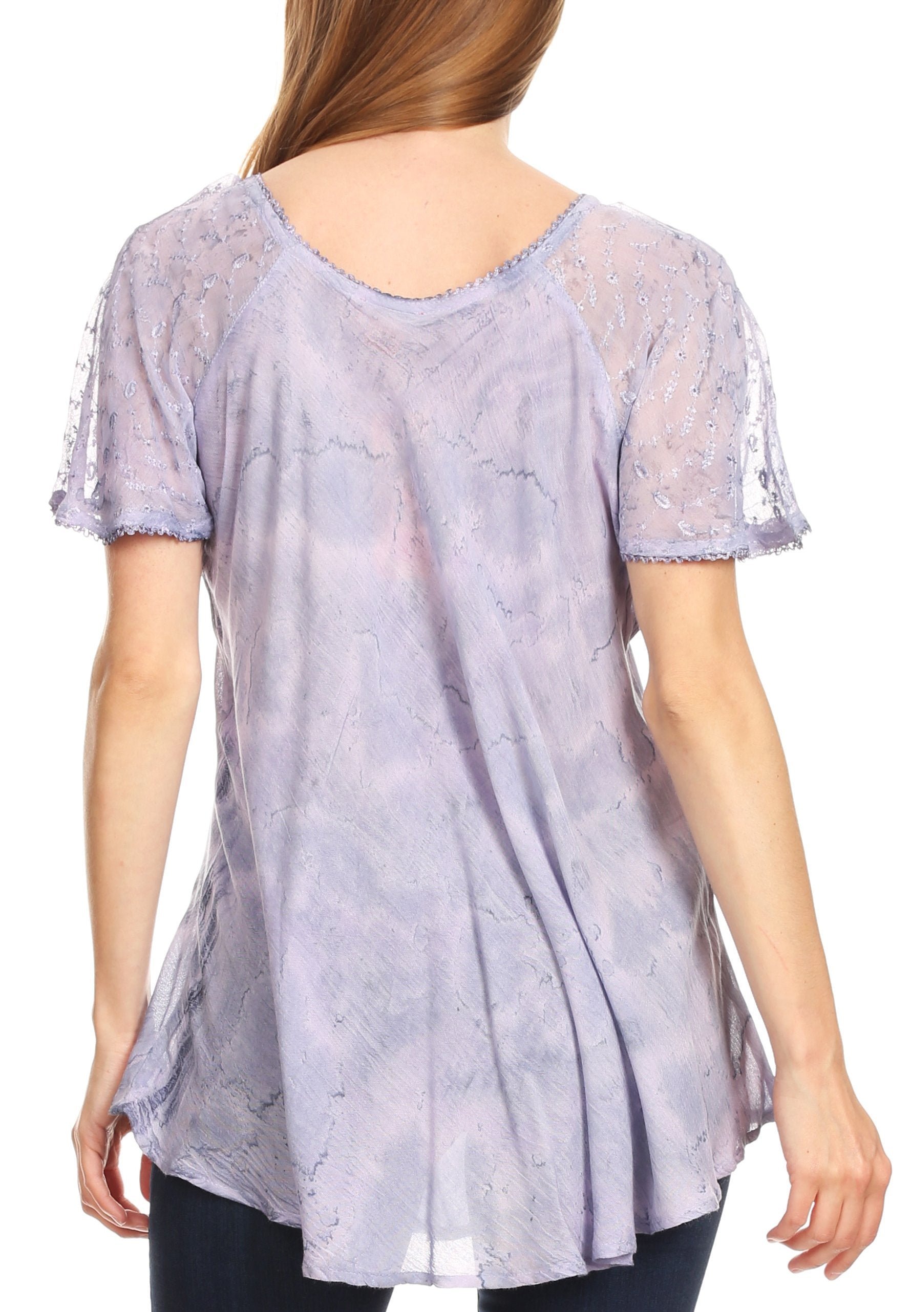 Light purple lace-trimmed top worn by a model on a white background