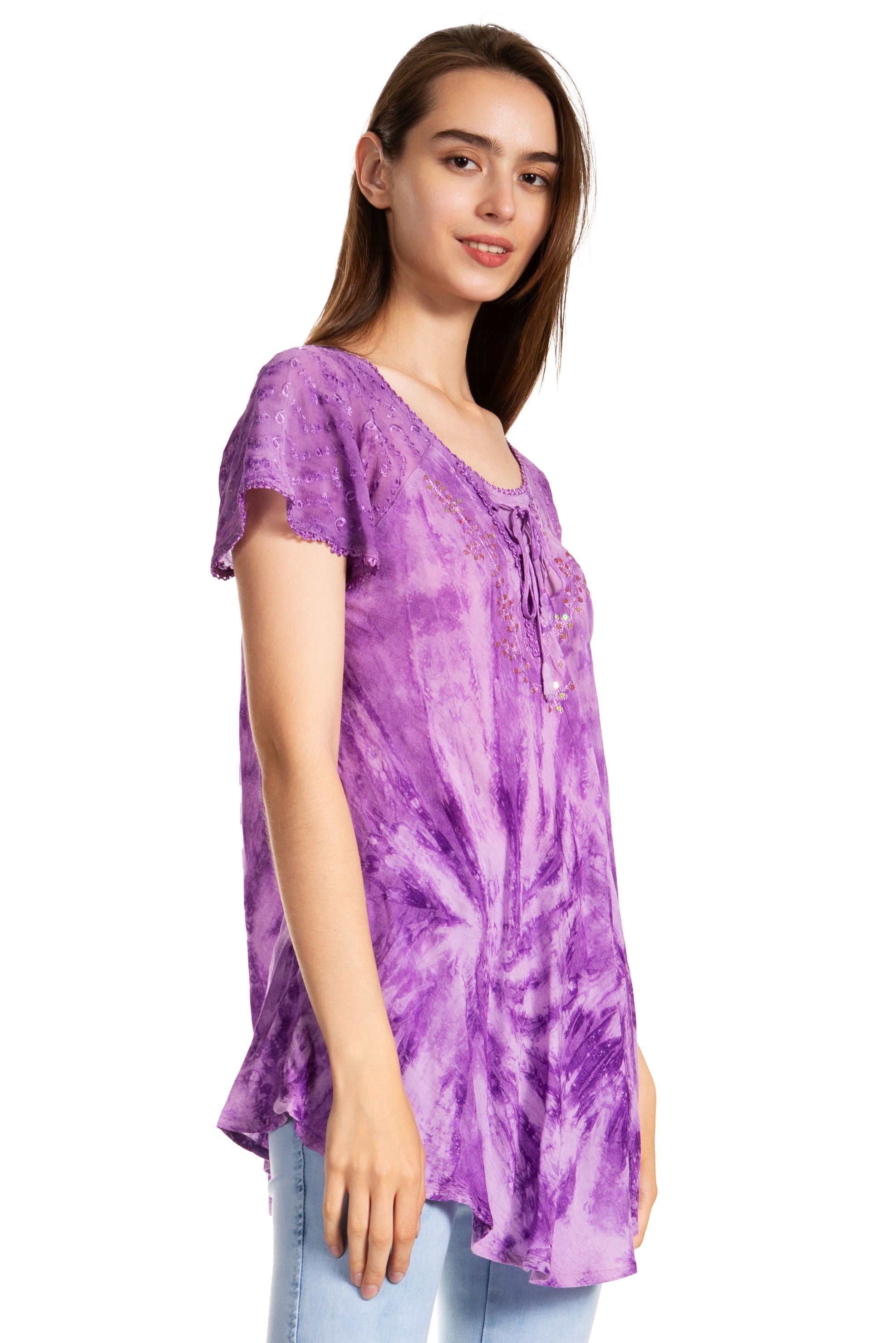 Woman wearing a purple tie-dye shirt on a white background