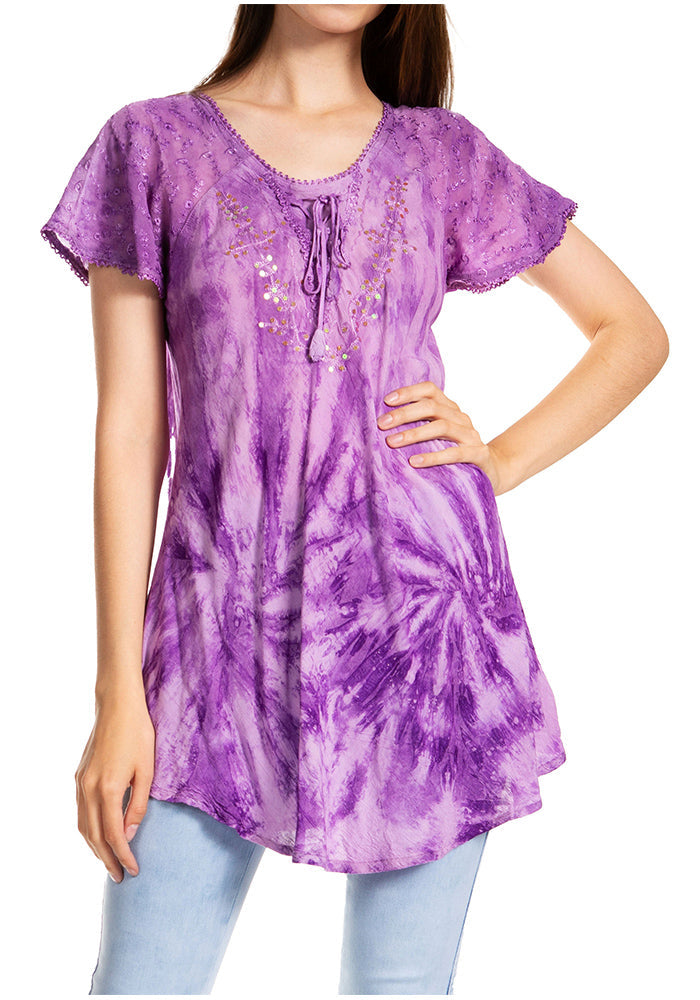 Purple tie-dye tunic worn by a model on a white background