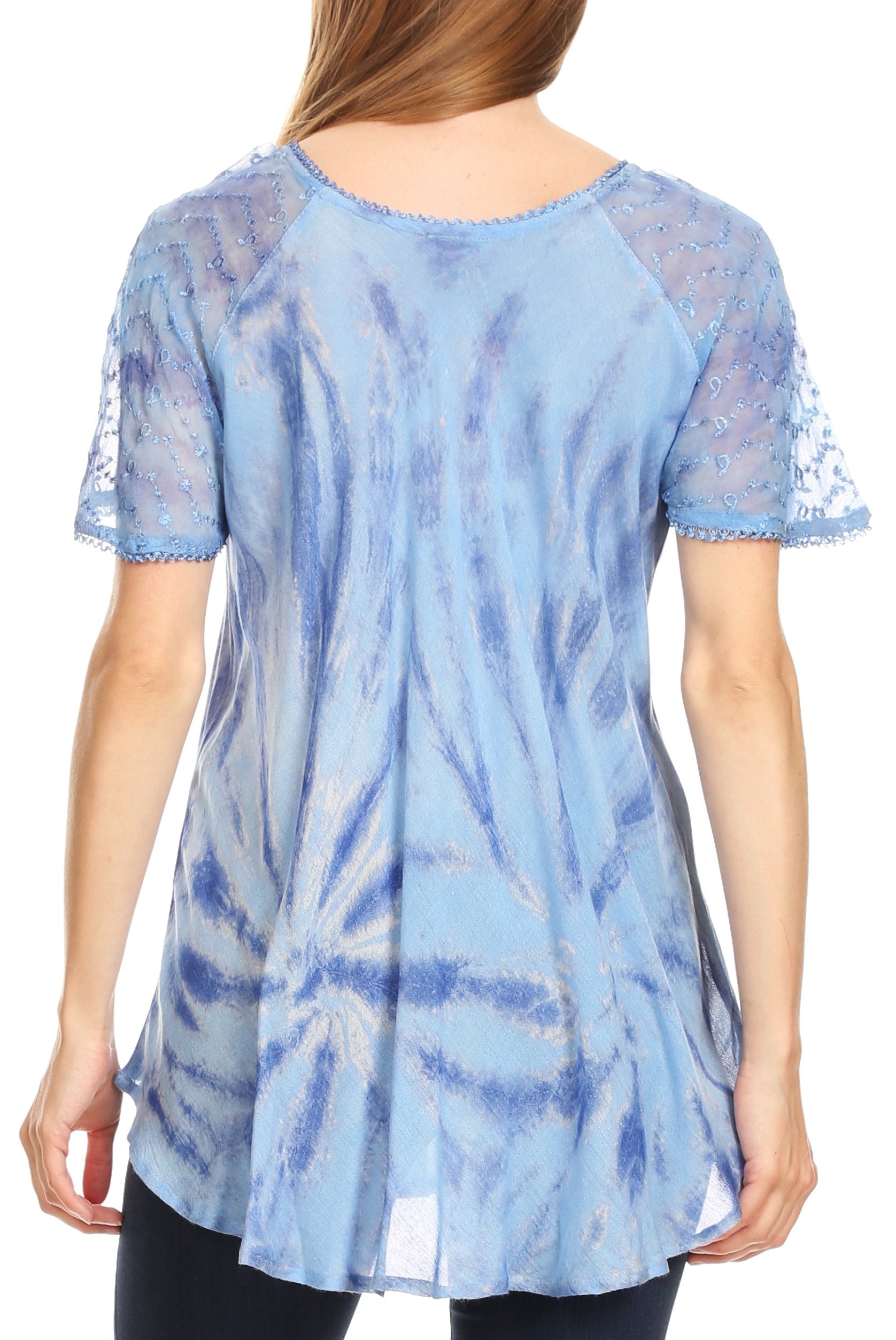 Blue tie-dye shirt with lace sleeves worn by a person on a white background