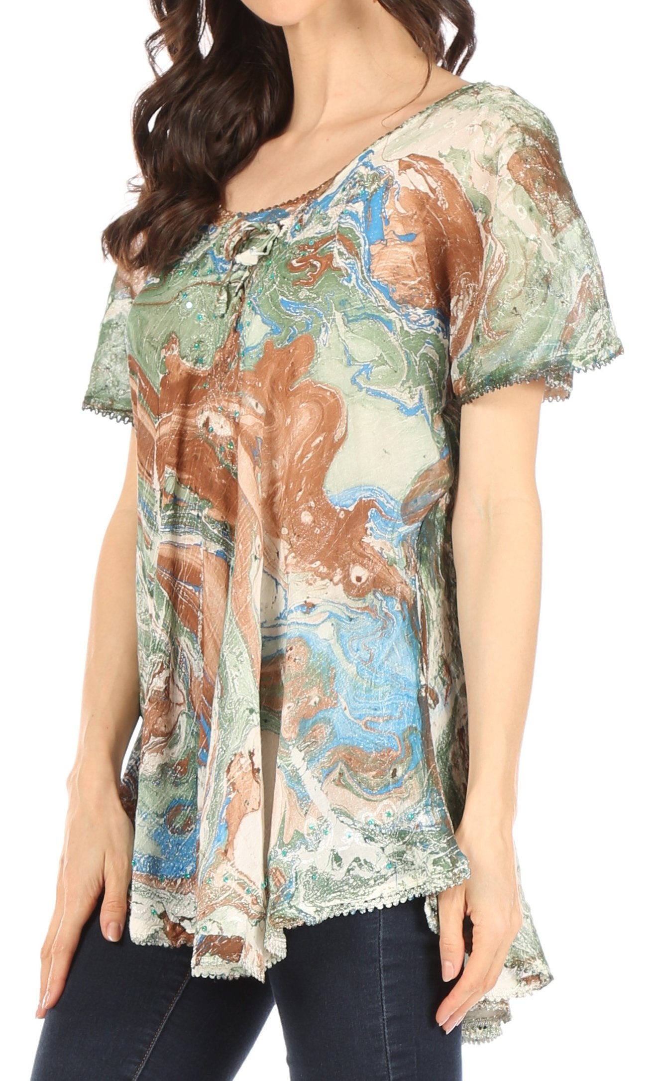 Woman wearing a short-sleeve blouse with a floral pattern on a white background