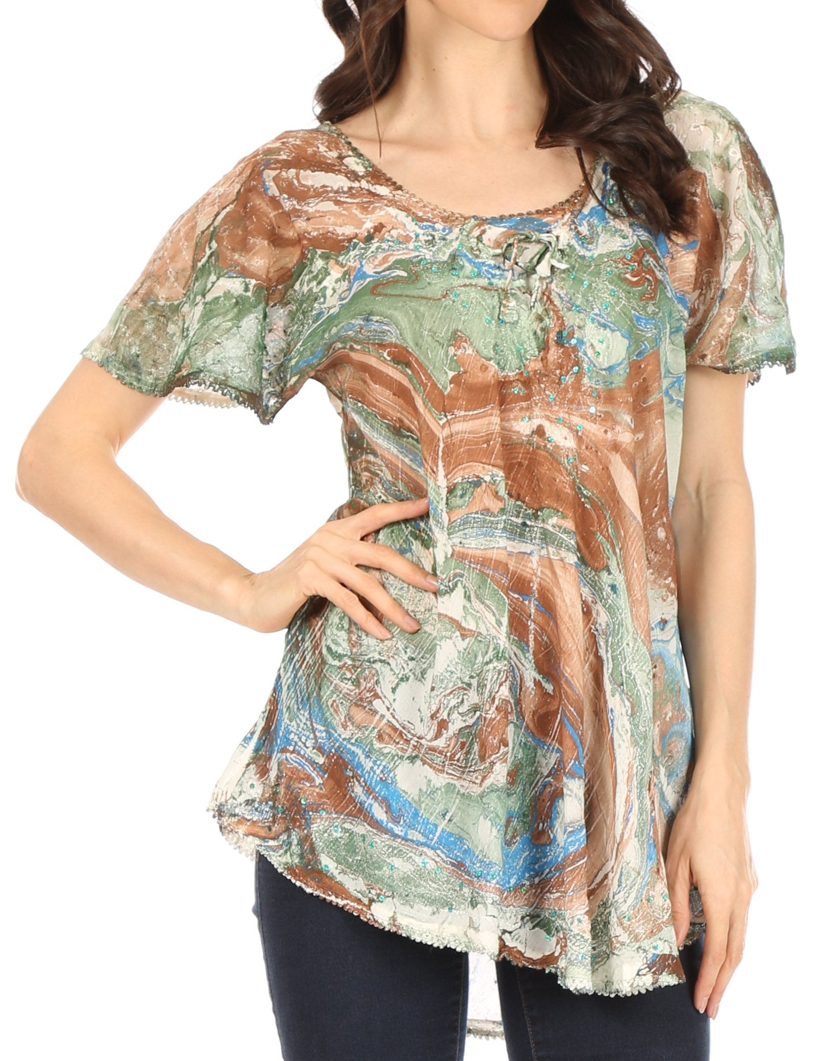 Woman wearing a patterned blouse with a white background