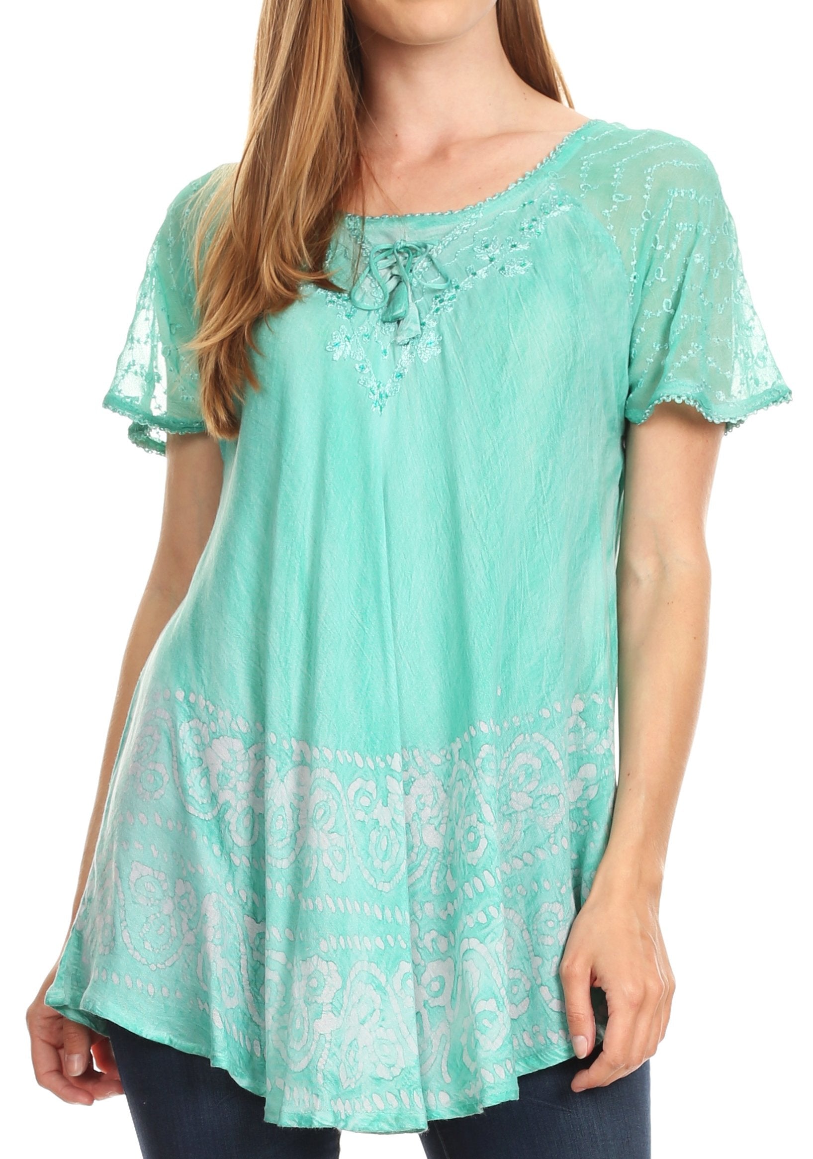 Mint green lace top worn by a model on a white background