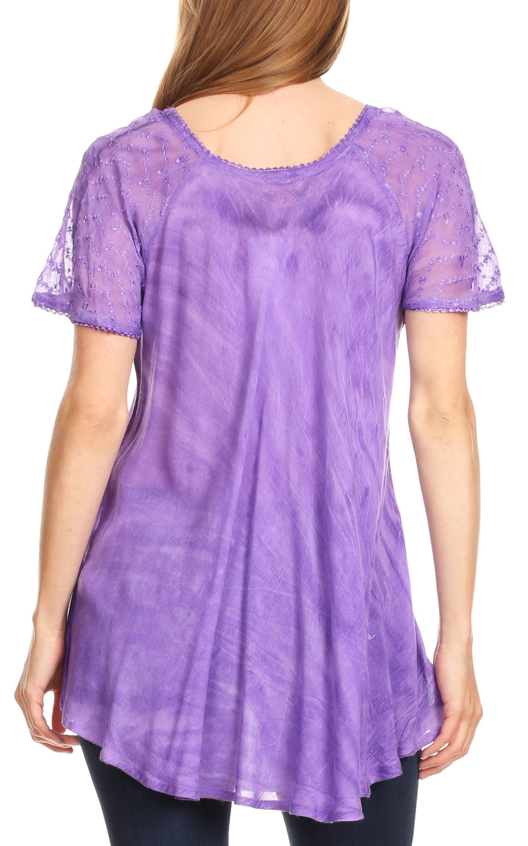 Purple lace top worn by a person on a white background