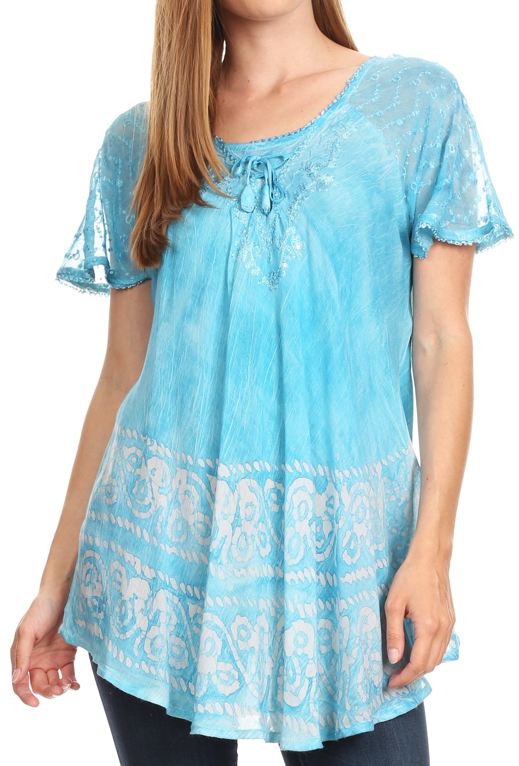 Light blue lace top worn by a person on a white background