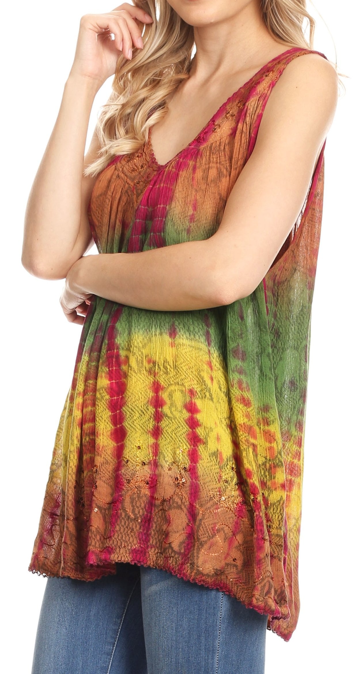Woman wearing a colorful tie-dye sleeveless top with a blurred background