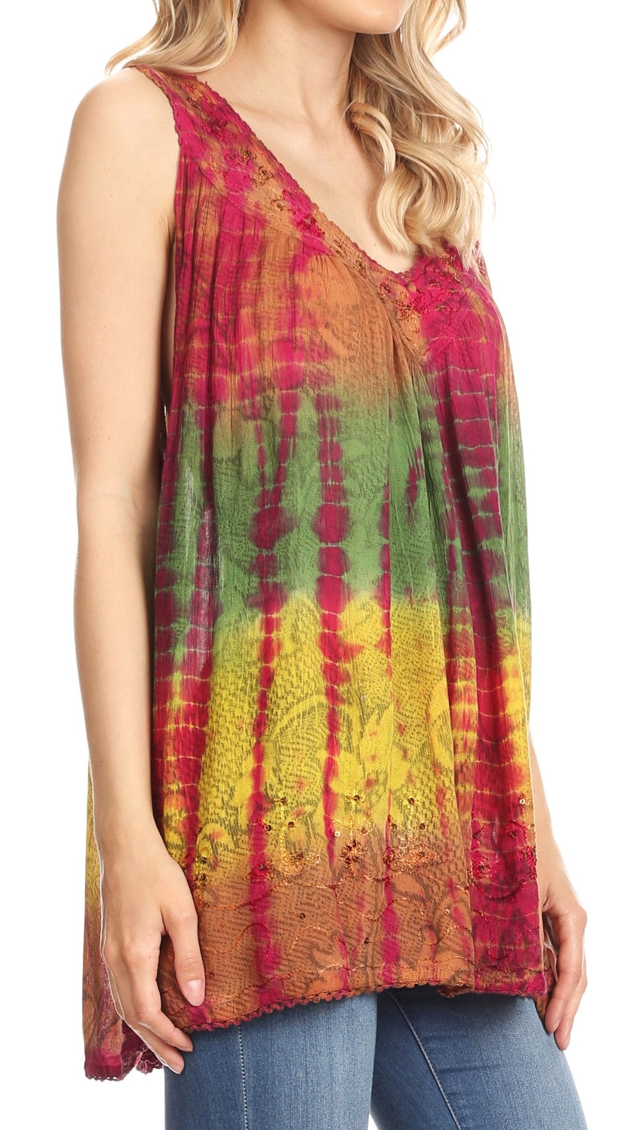 Woman wearing a colorful tie-dye sleeveless top with a white background