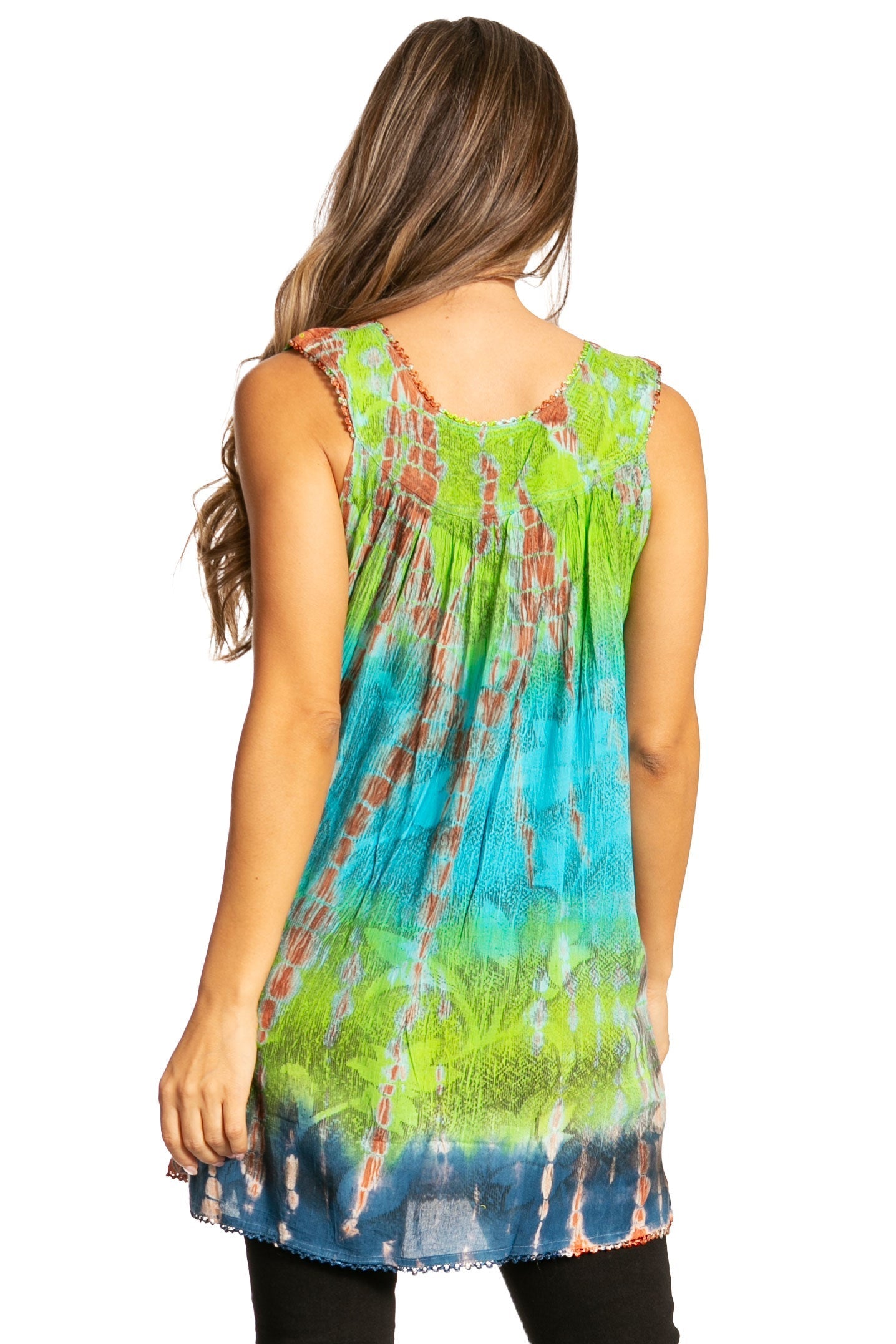 Woman wearing a sleeveless tie-dye top on a white background