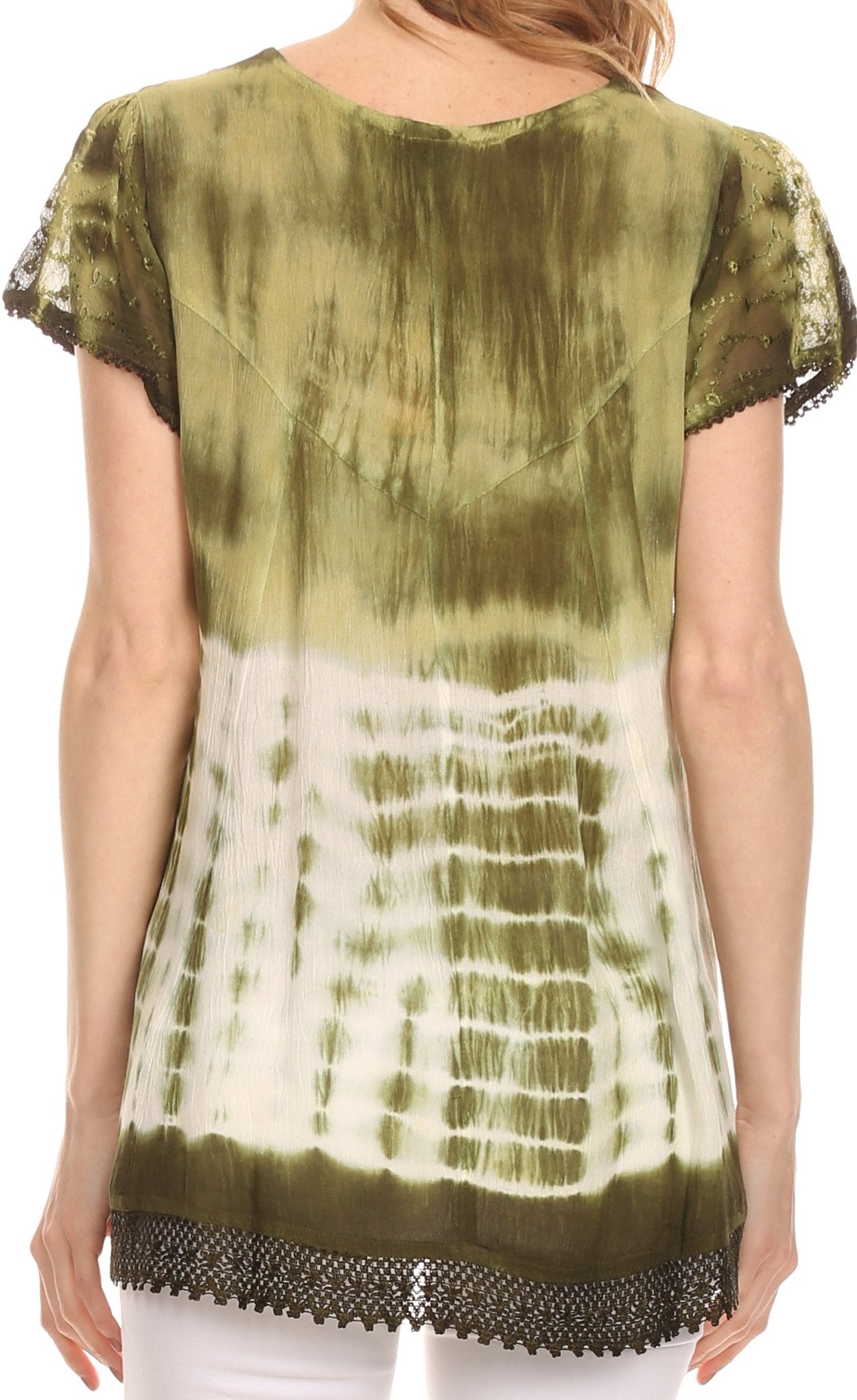 Woman wearing a tie-dye shirt with green and white pattern
