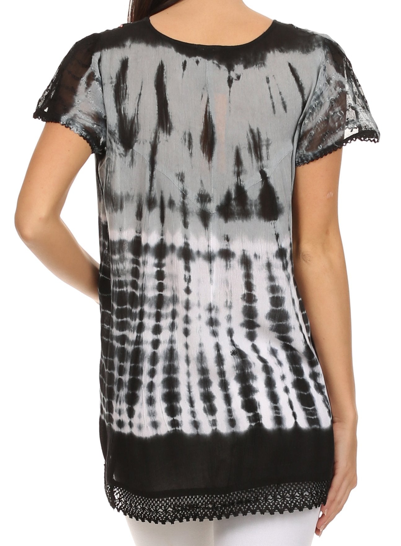 Black and white tie-dye top with lace trim on a white background