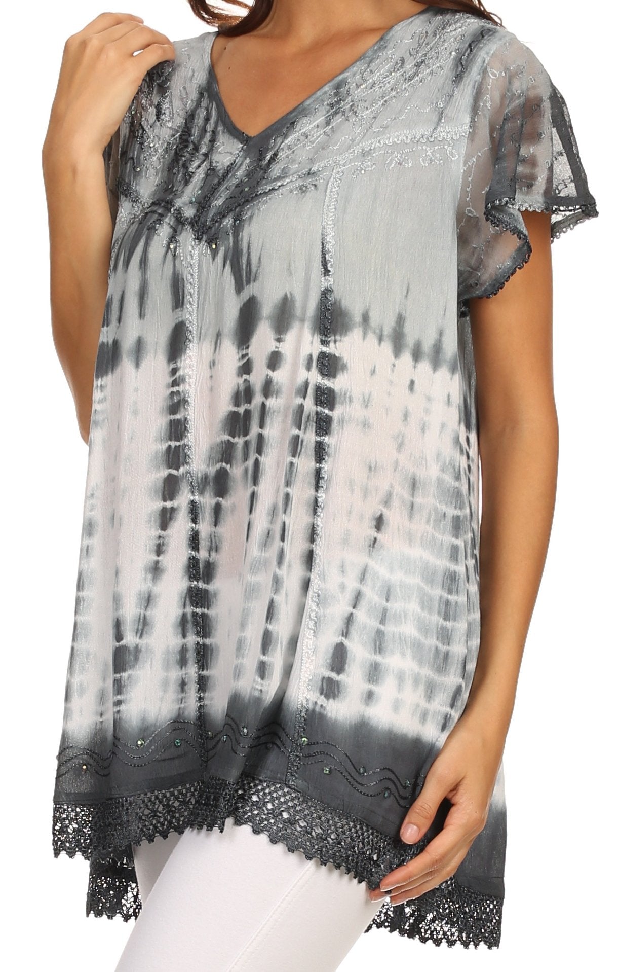 Tie-dye shirt with lace trim worn by a person on a white background