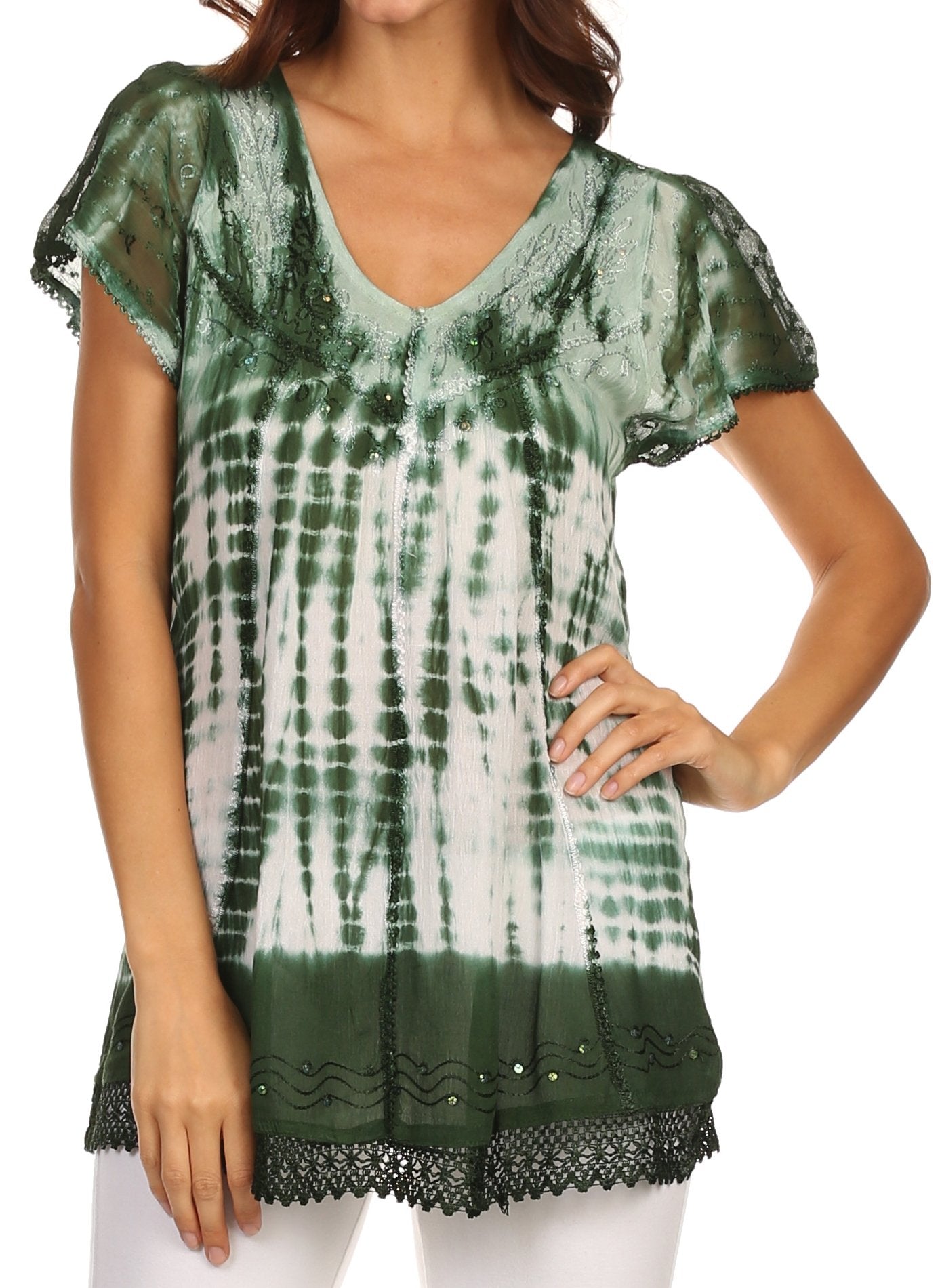 Green and white tie-dye top with lace details on a model against a white background