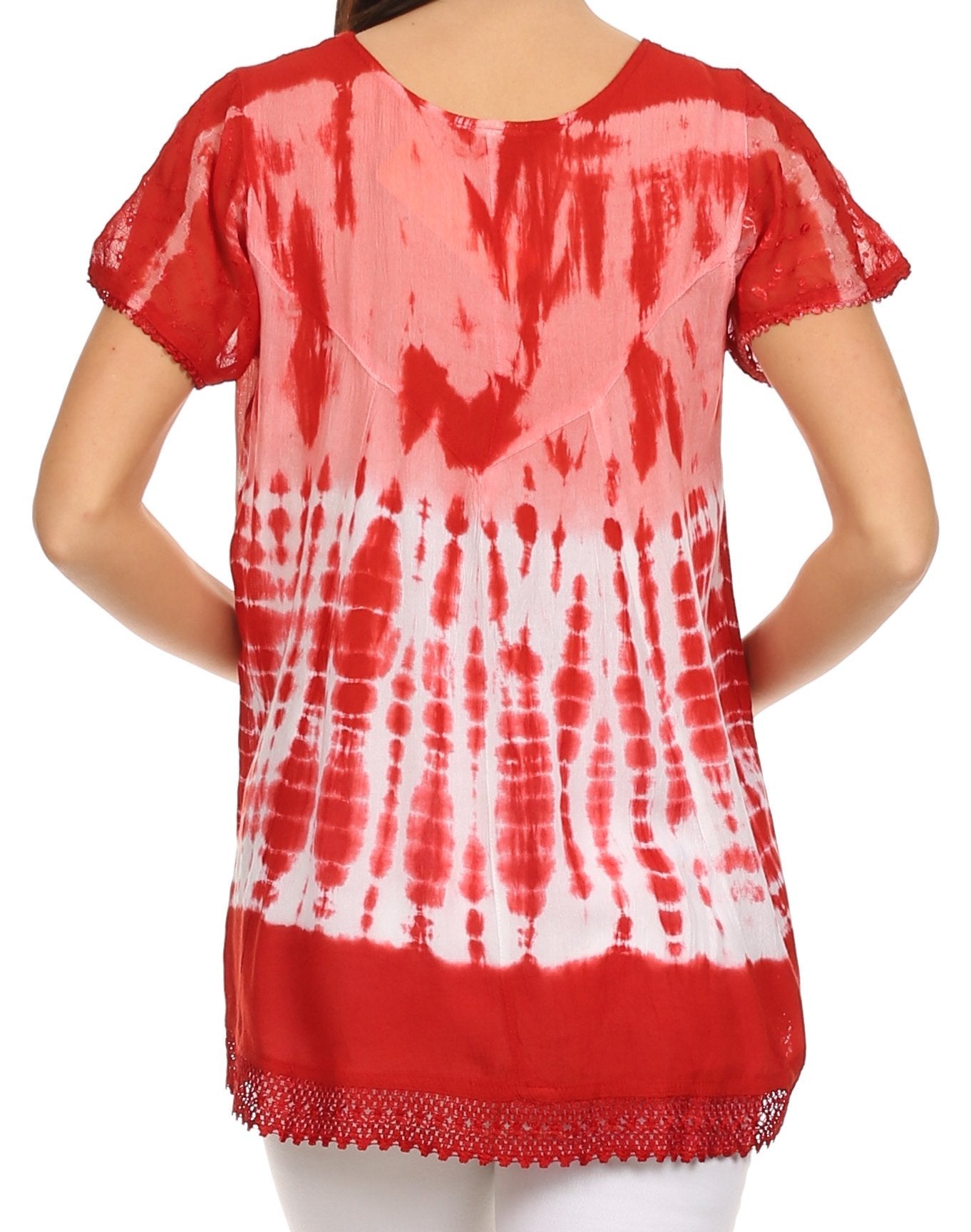 Red and white tie-dye top worn by a person on a white background