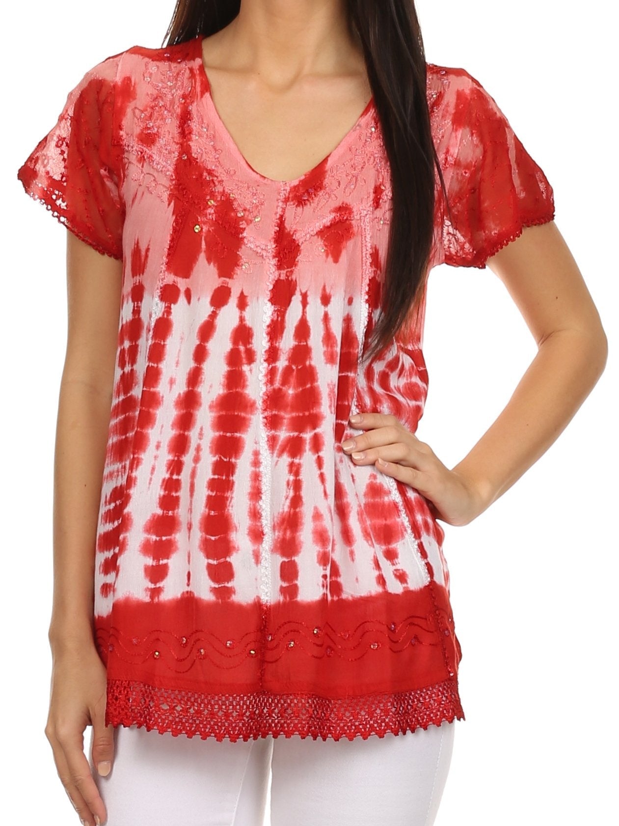 Red and white tie-dye top with lace trim worn by a model on a white background