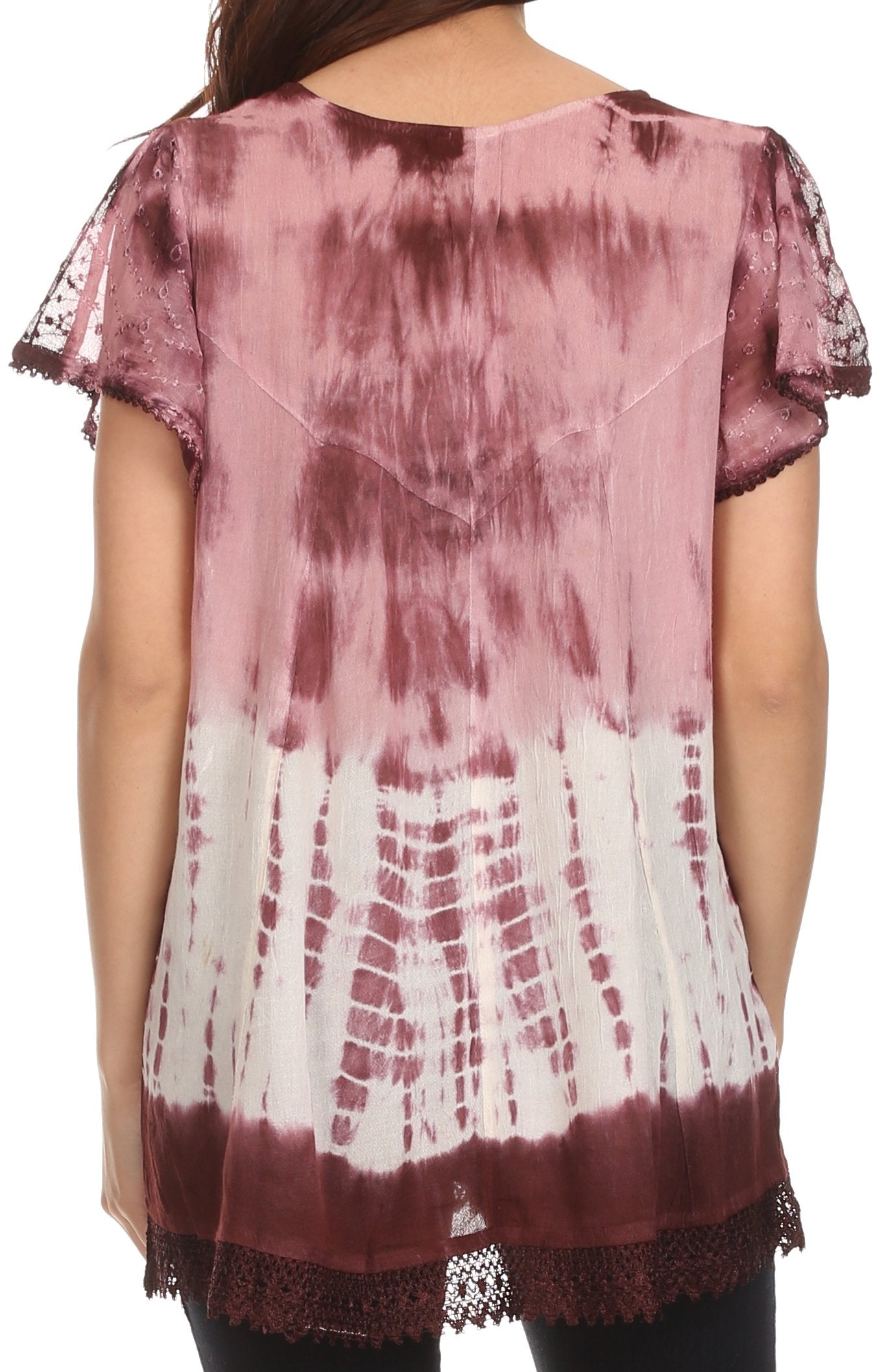 Tie-dye shirt with lace sleeves and hem on a plain background