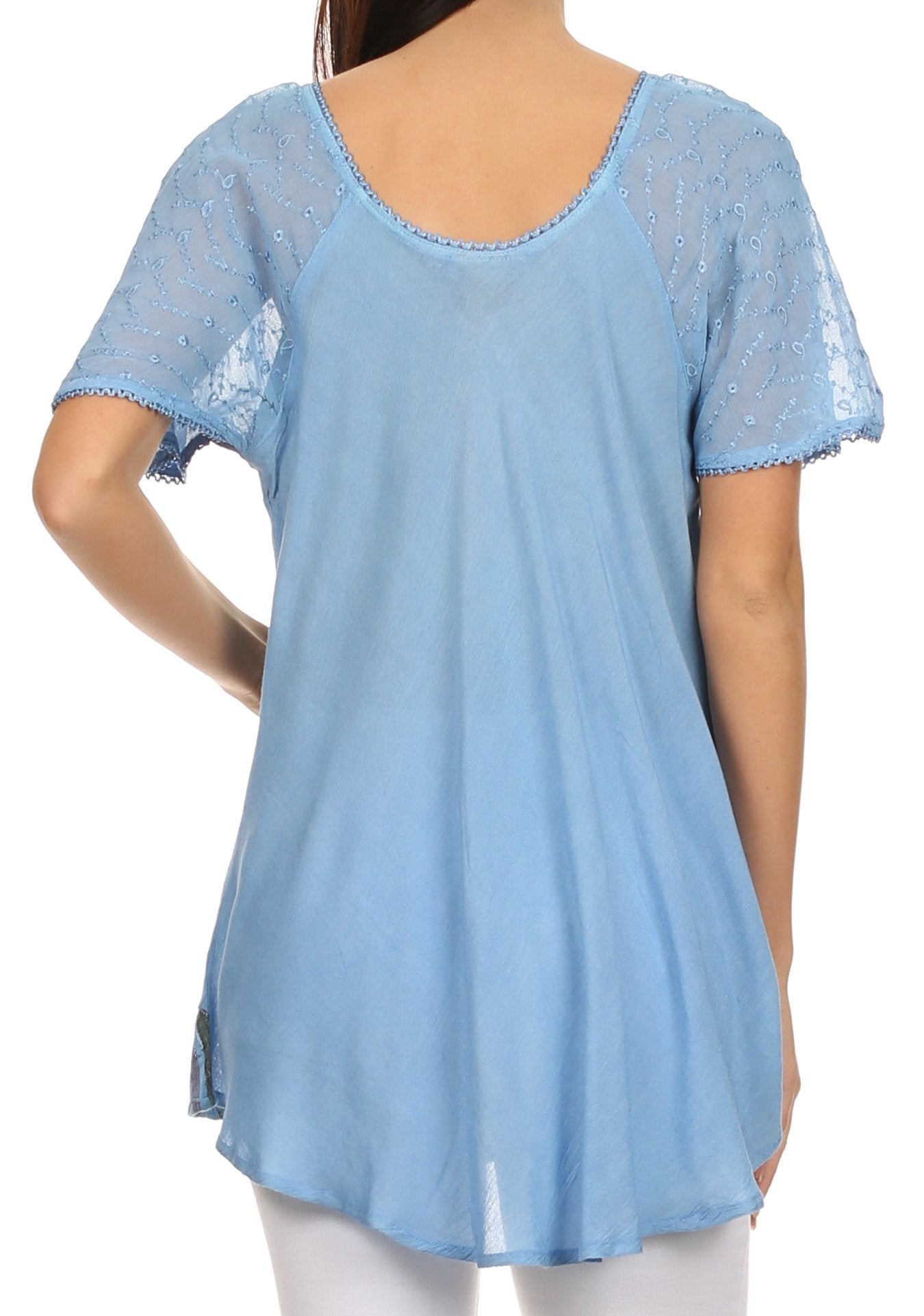 Light blue lace-trimmed top worn by a person on a white background