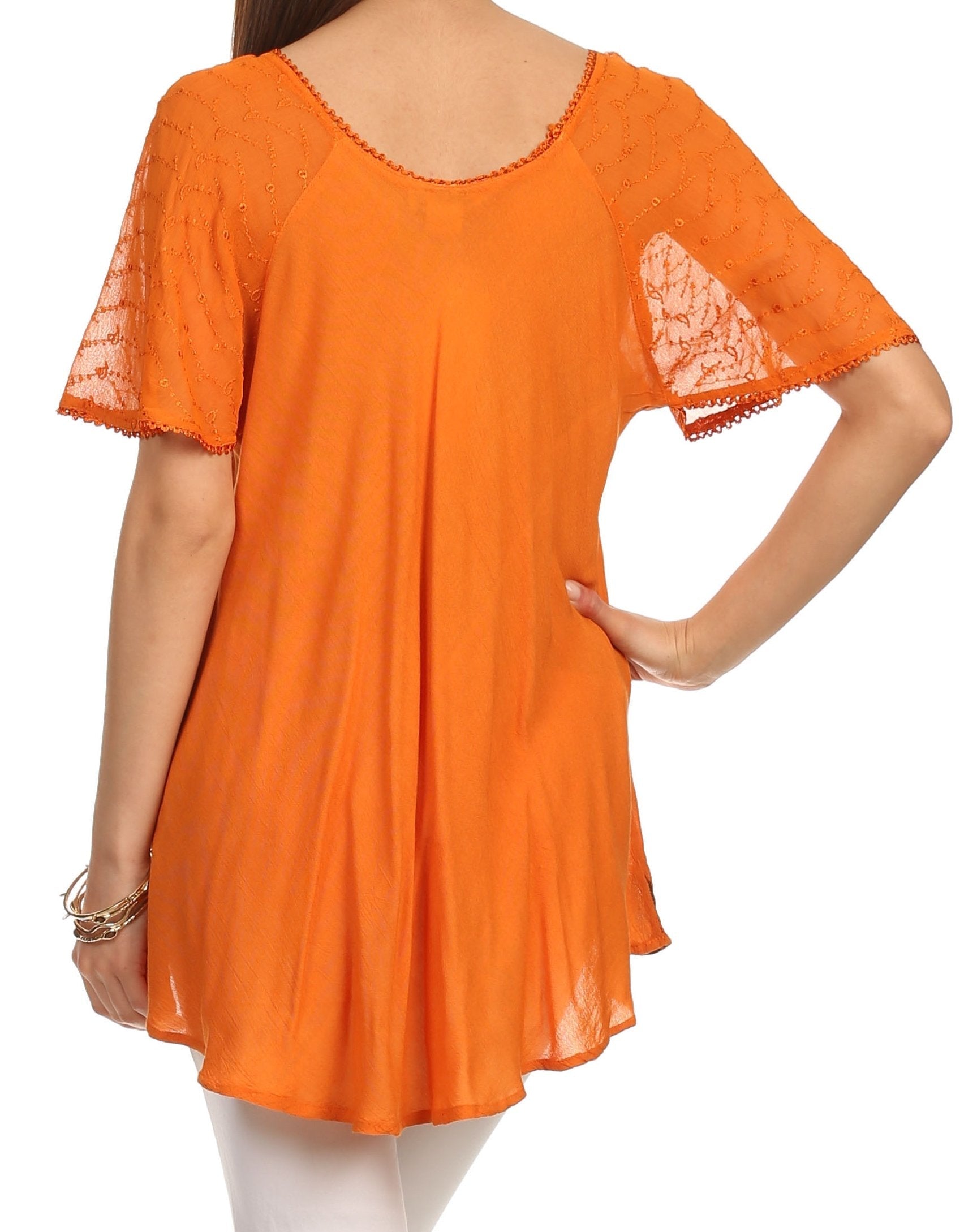 Orange blouse with lace sleeves on a white background