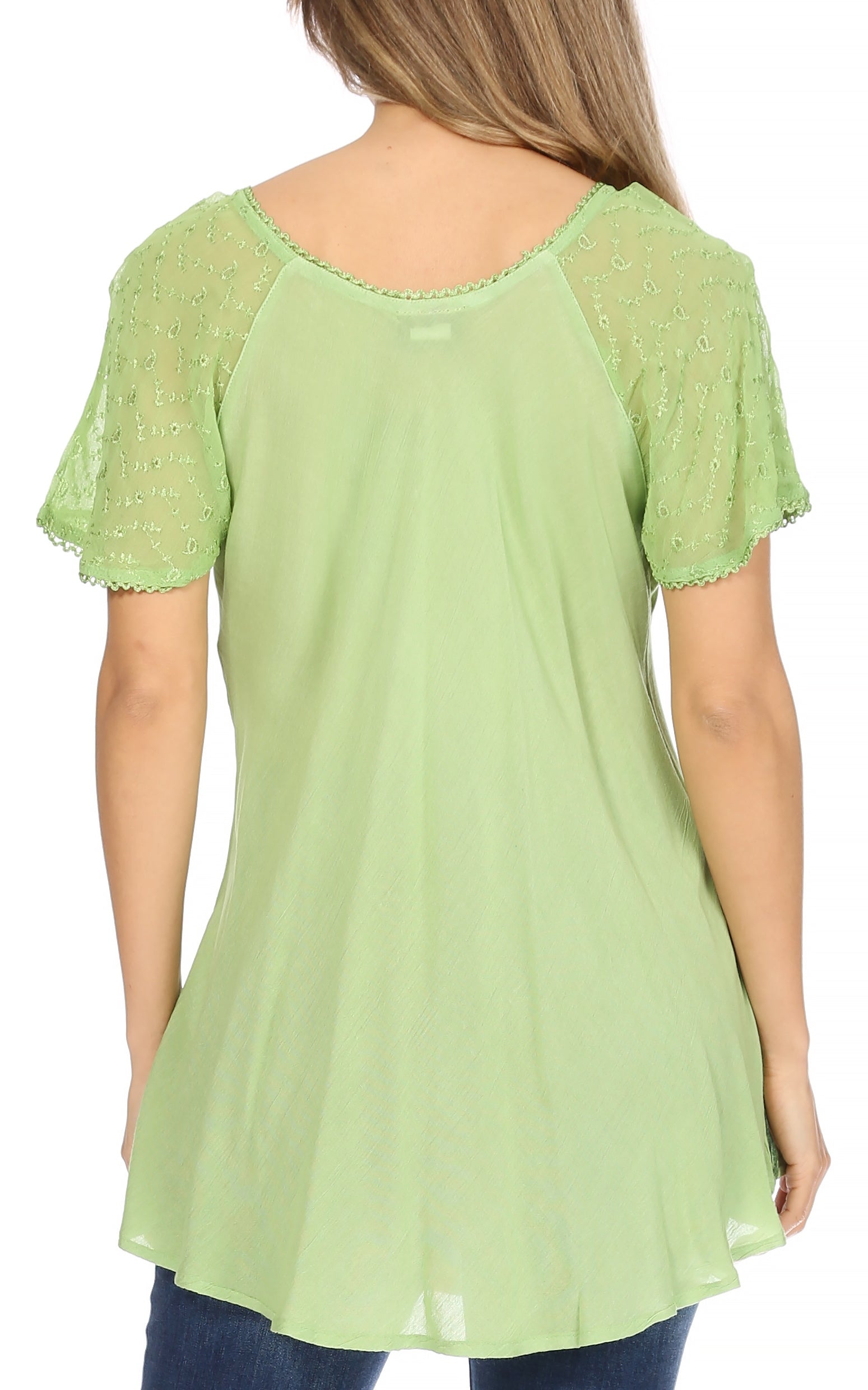 Light green blouse with lace details on a white background
