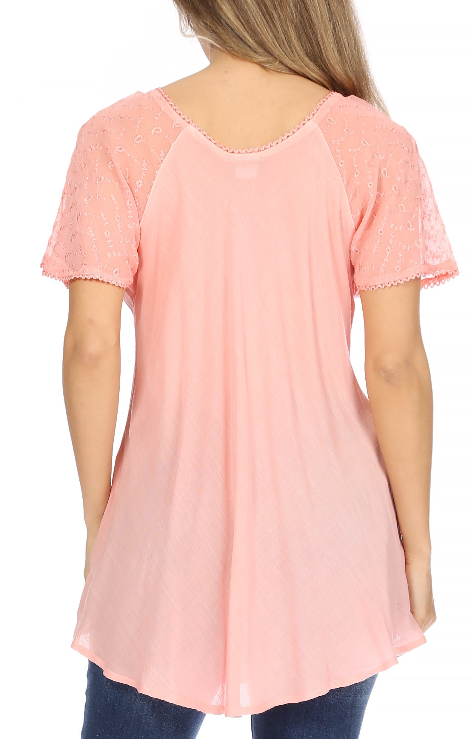 Pink blouse with lace trim on a white background