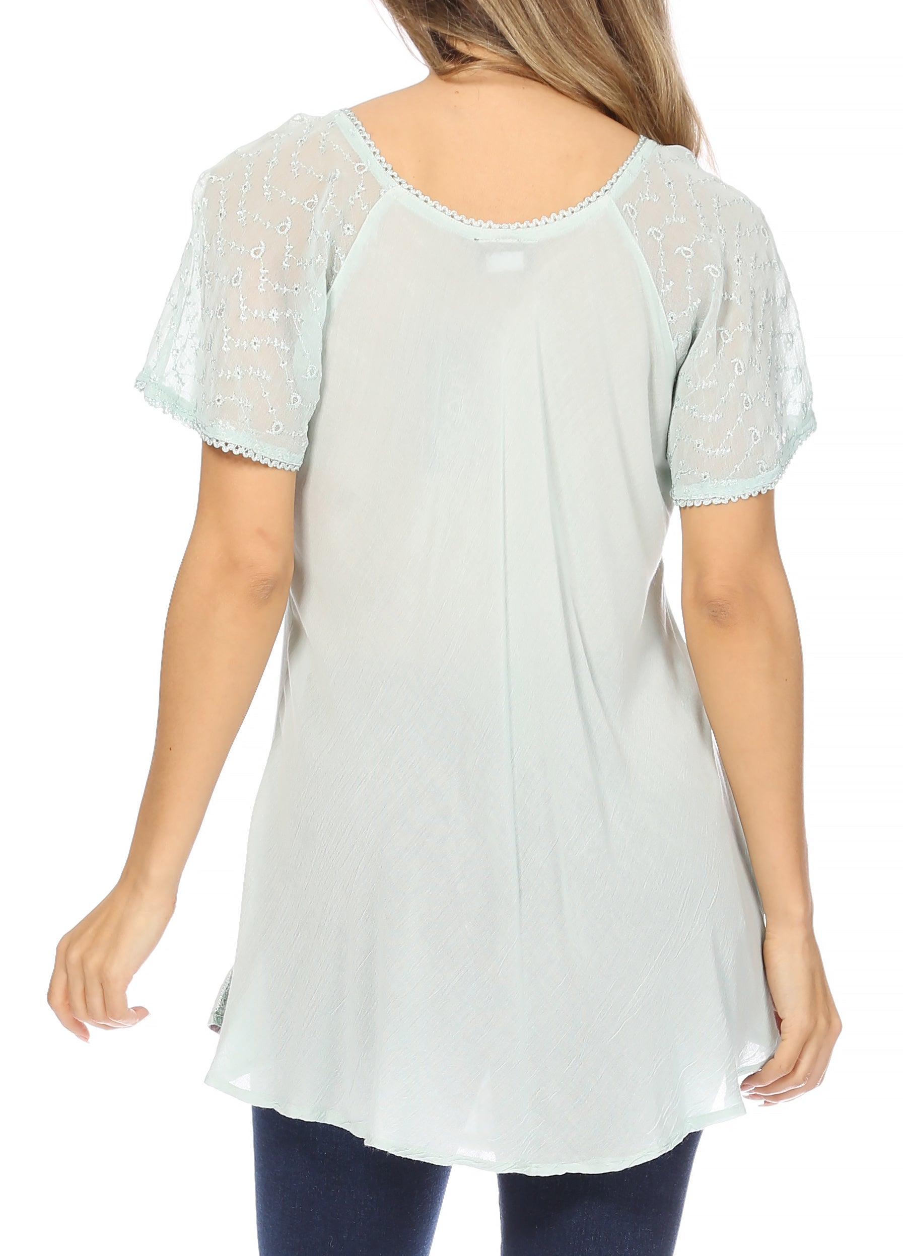 Light blue blouse with lace details on a white background