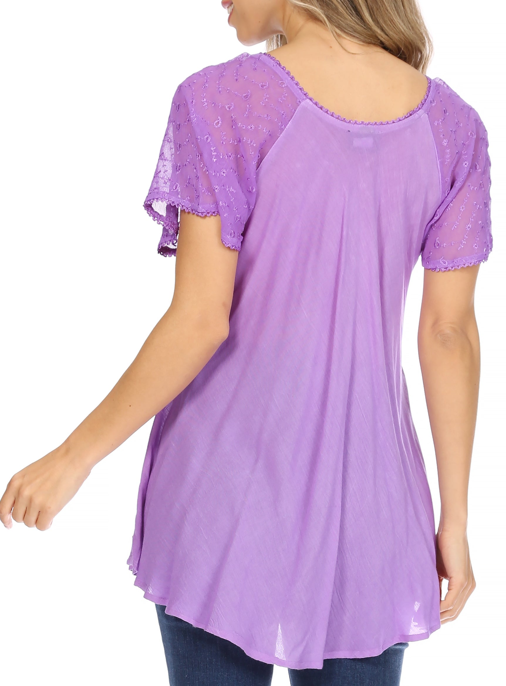 Purple lace-trimmed top worn by a person on a white background