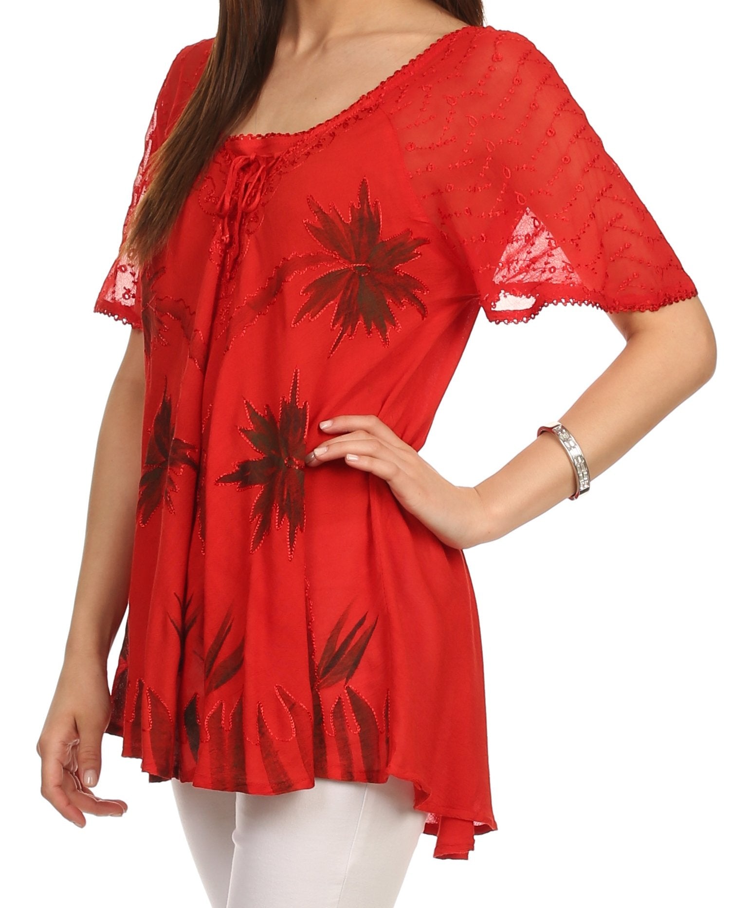 Red blouse with floral patterns on a white background