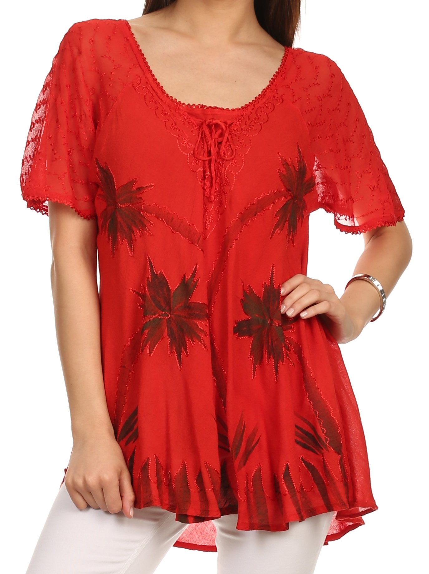Red lace top with floral patterns on a white background