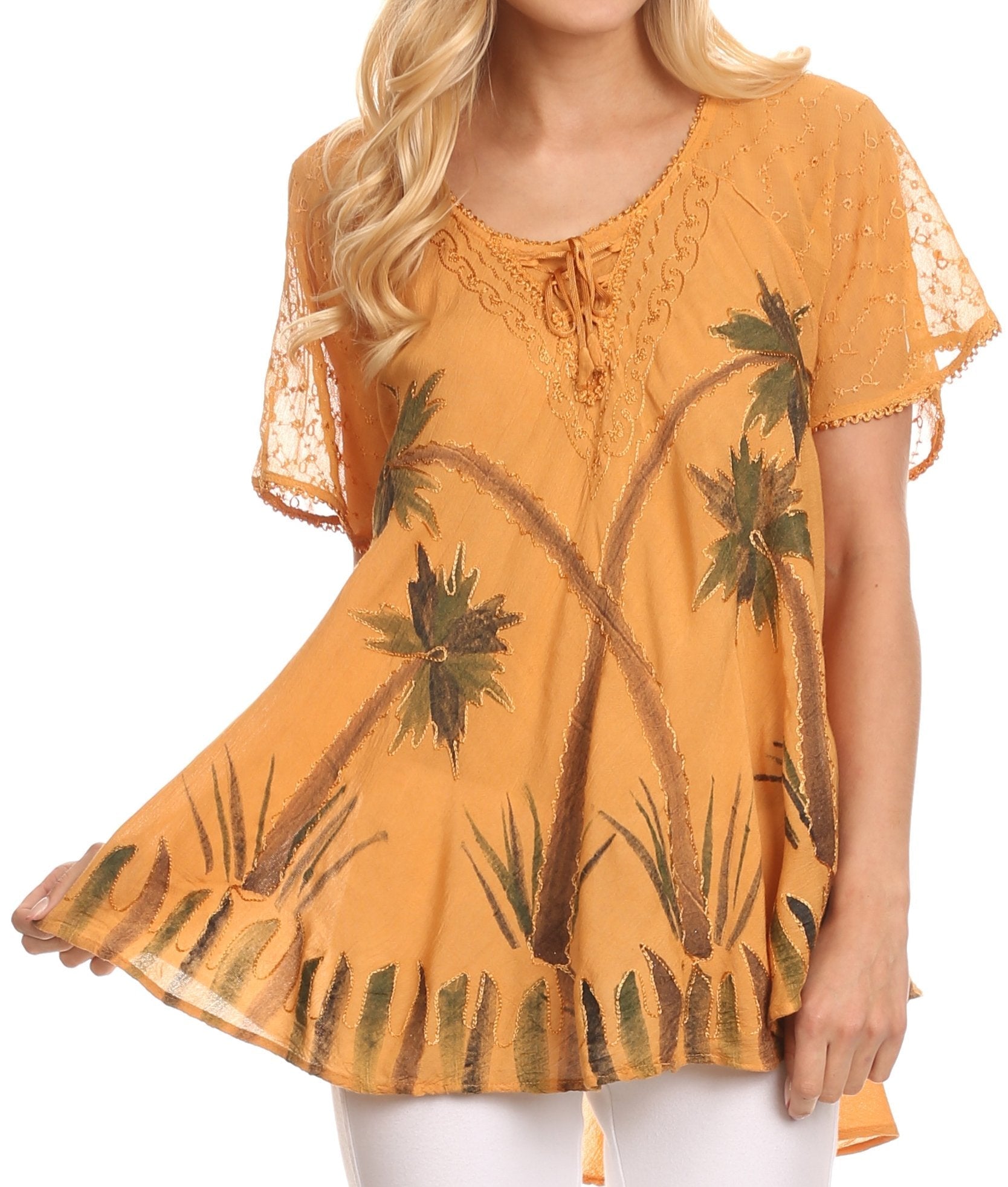 Woman wearing a mustard yellow blouse with palm tree design on a white background