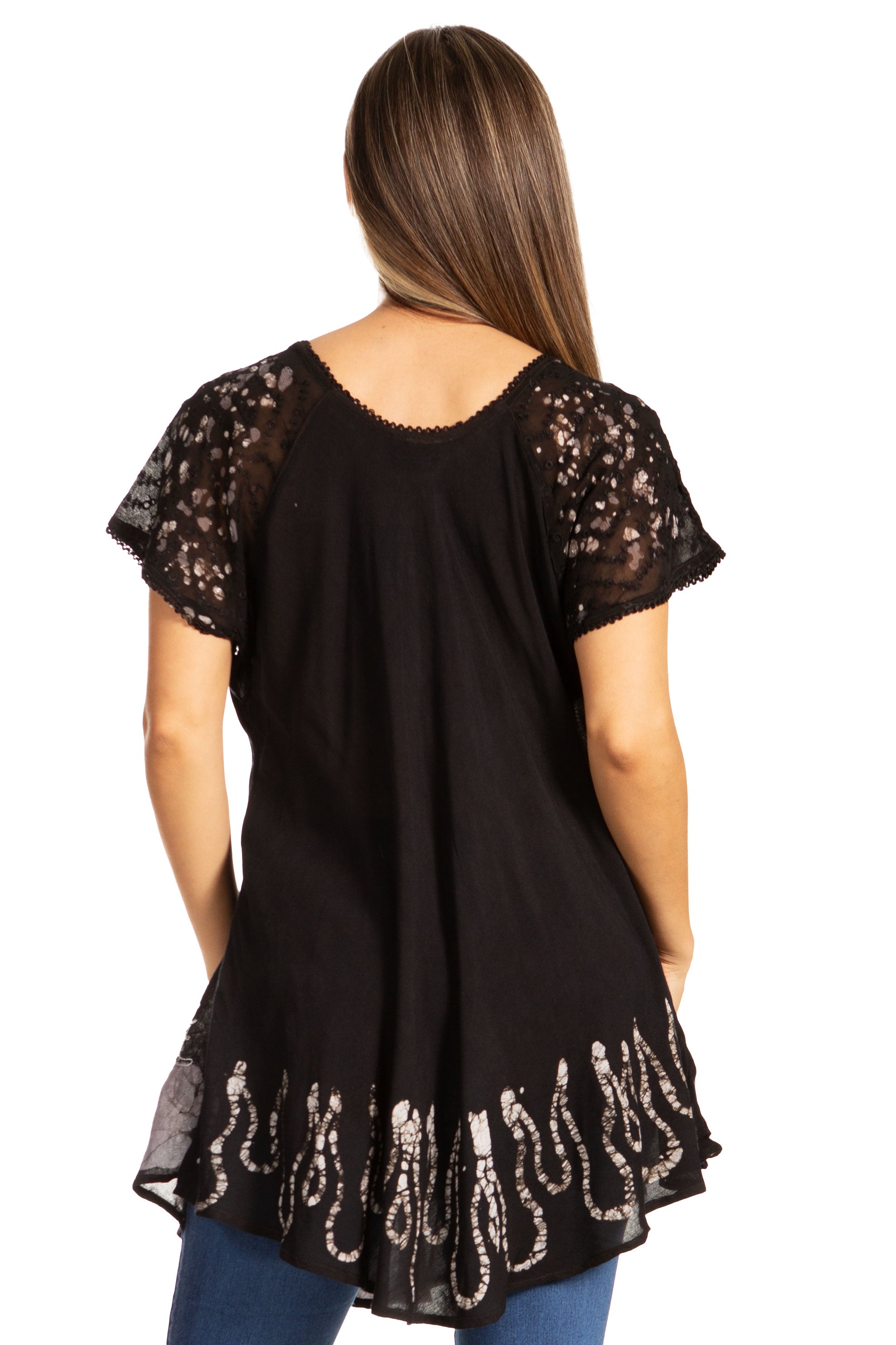 Black lace-trimmed top worn by a person on a white background